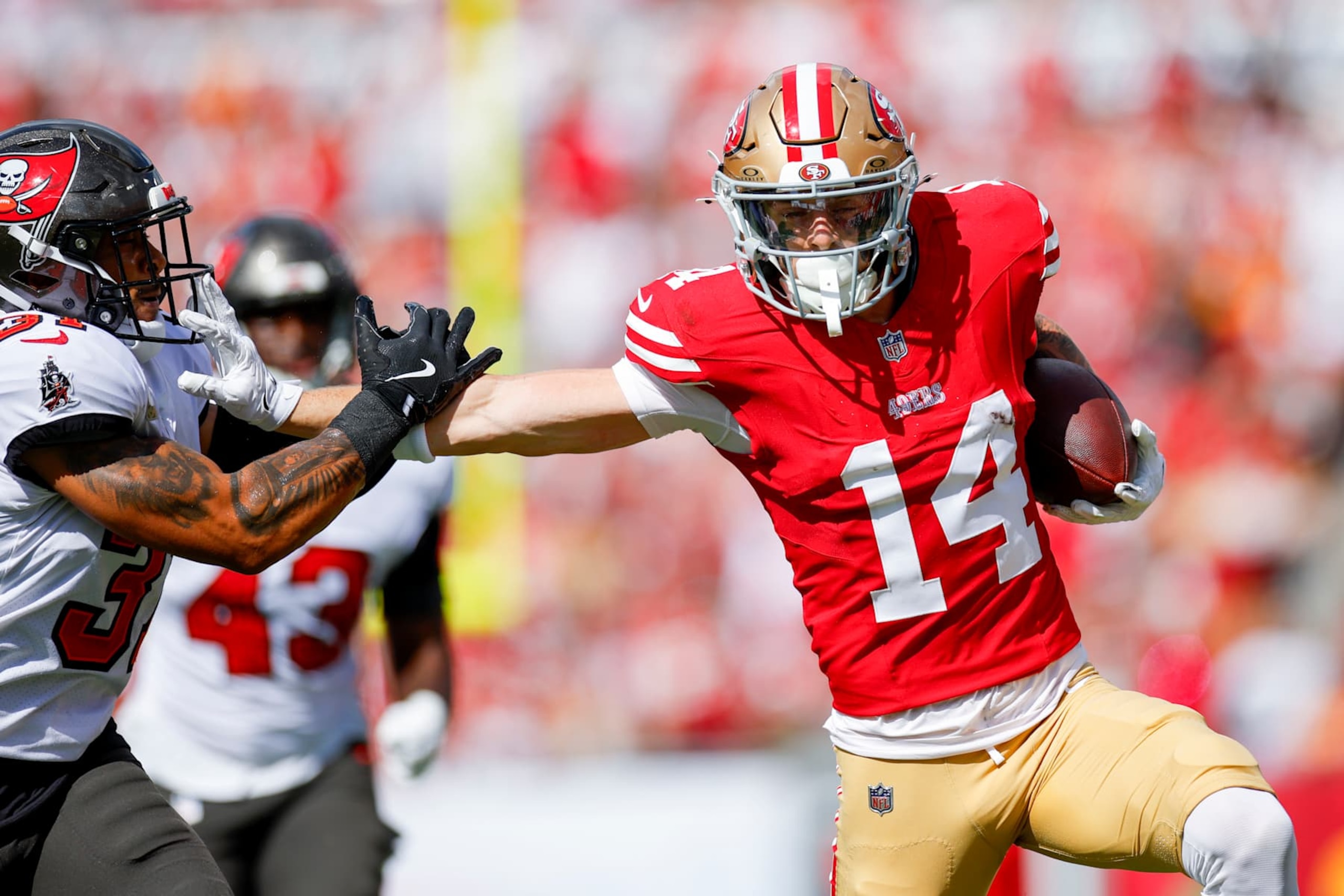 TAMPA, FLORIDA - NOVEMBER 10: Ricky Pearsall #14 of the San Francisco 49ers runs with the ball for a touchdown during the first quarter against the Tampa Bay Buccaneers at Raymond James Stadium on November 10, 2024 in Tampa, Florida. (Photo by Mike Ehrmann/Getty Images)