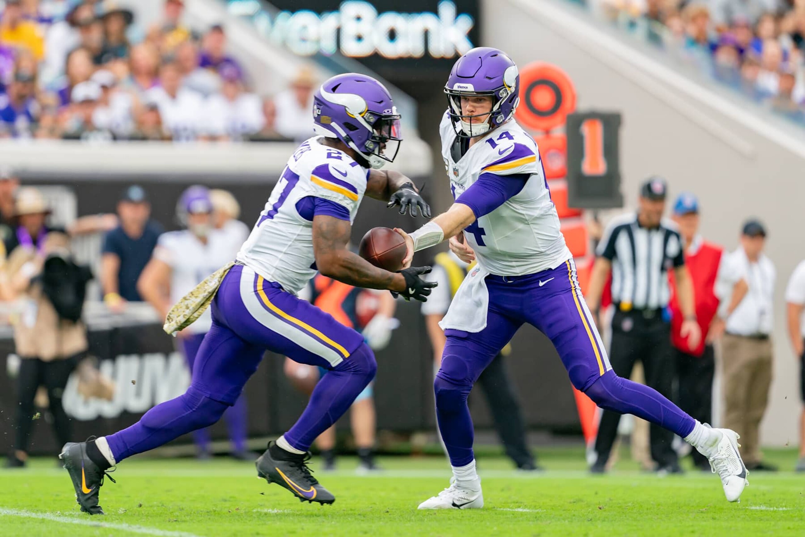 JACKSONVILLE, FL - NOVEMBER 10: Minnesota Vikings quarterback Sam Darnold (14) hands off to Minnesota Vikings running back Cam Akers (27) during an NFL game between the Minnesota Vikings and the Jacksonville Jaguars on November 10th, 2024 at EverBank Stadium in Jacksonville, FL.(Photo by Chris Leduc/Icon Sportswire via Getty Images)
