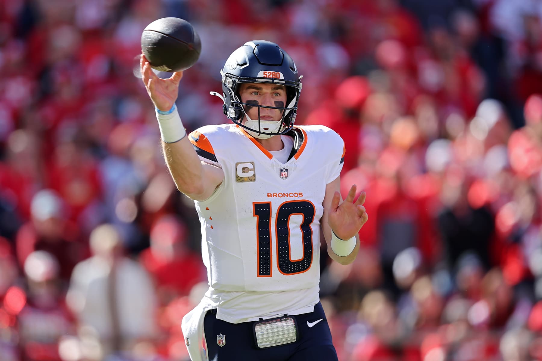KANSAS CITY, MISSOURI - NOVEMBER 10: Bo Nix #10 of the Denver Broncos looks to pass in the first quarter of a game against the Kansas City Chiefs at GEHA Field at Arrowhead Stadium on November 10, 2024 in Kansas City, Missouri. (Photo by David Eulitt/Getty Images)