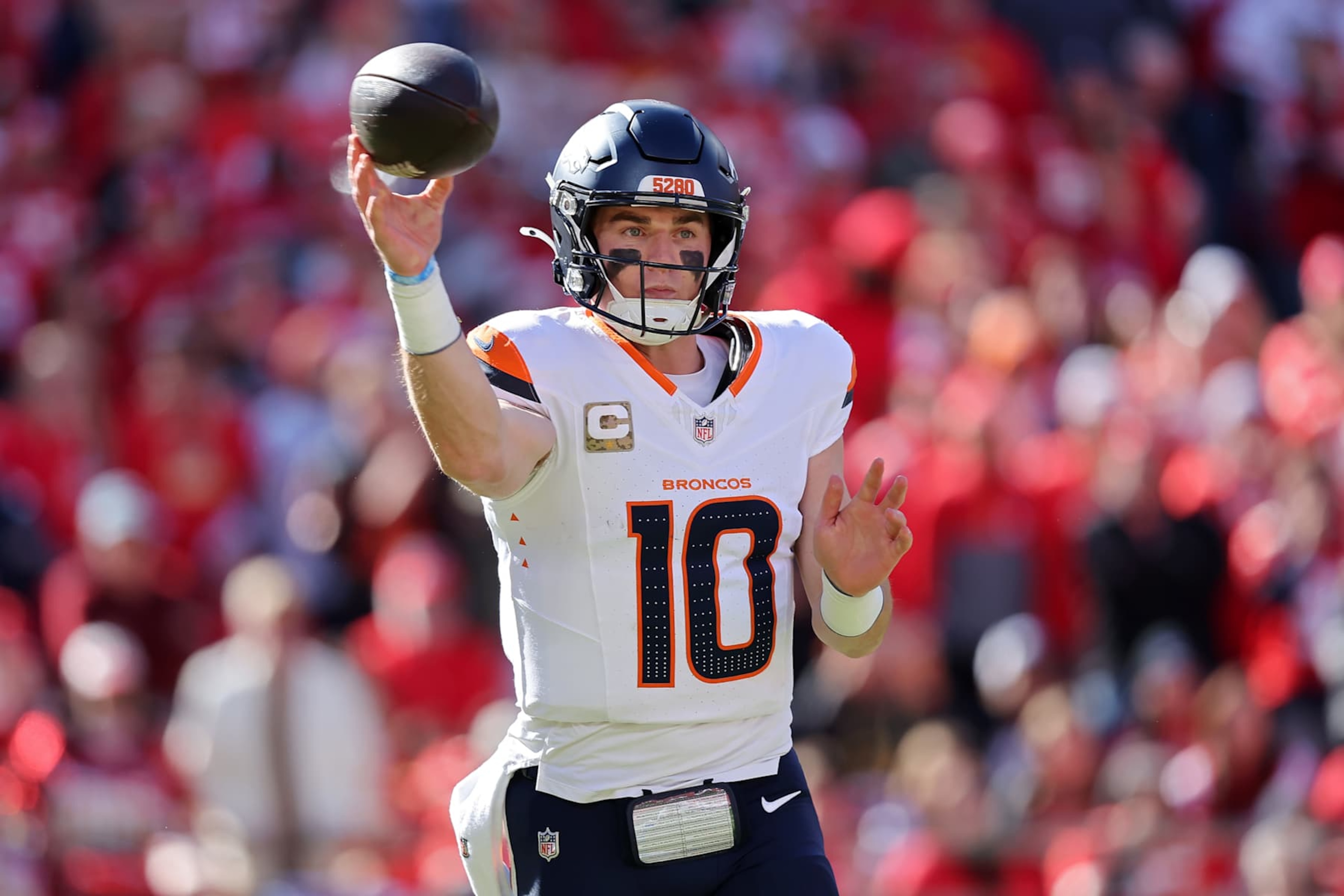 KANSAS CITY, MISSOURI - NOVEMBER 10: Bo Nix #10 of the Denver Broncos looks to pass in the first quarter of a game against the Kansas City Chiefs at GEHA Field at Arrowhead Stadium on November 10, 2024 in Kansas City, Missouri. (Photo by David Eulitt/Getty Images)