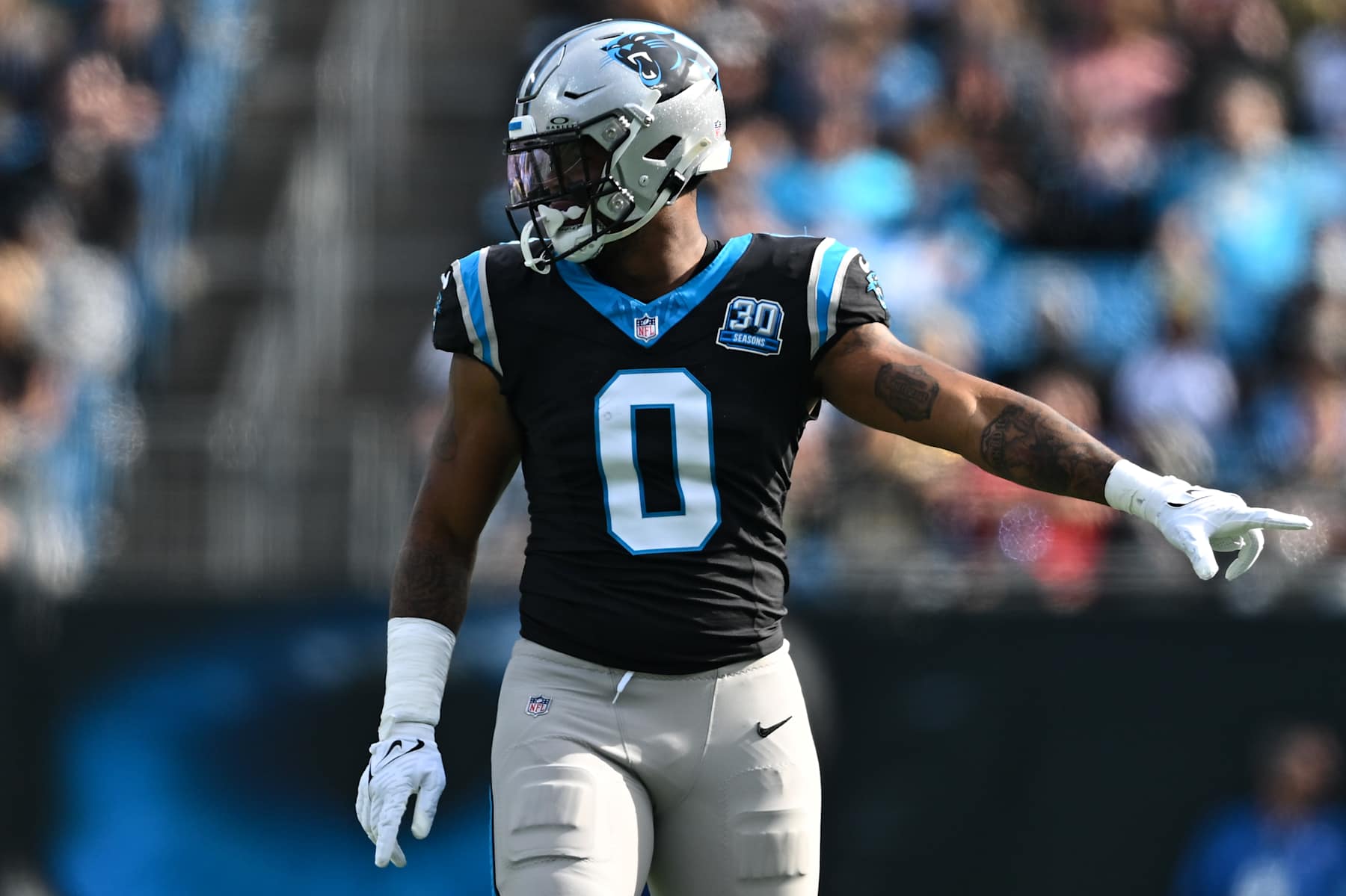 CHARLOTTE, NORTH CAROLINA - NOVEMBER 03: Ja'Tavion Sanders #0 of the Carolina Panthers points during the second quarter of his game against the New Orleans Saints at Bank of America Stadium on November 03, 2024 in Charlotte, North Carolina. (Photo by Matt Kelley/Getty Images)