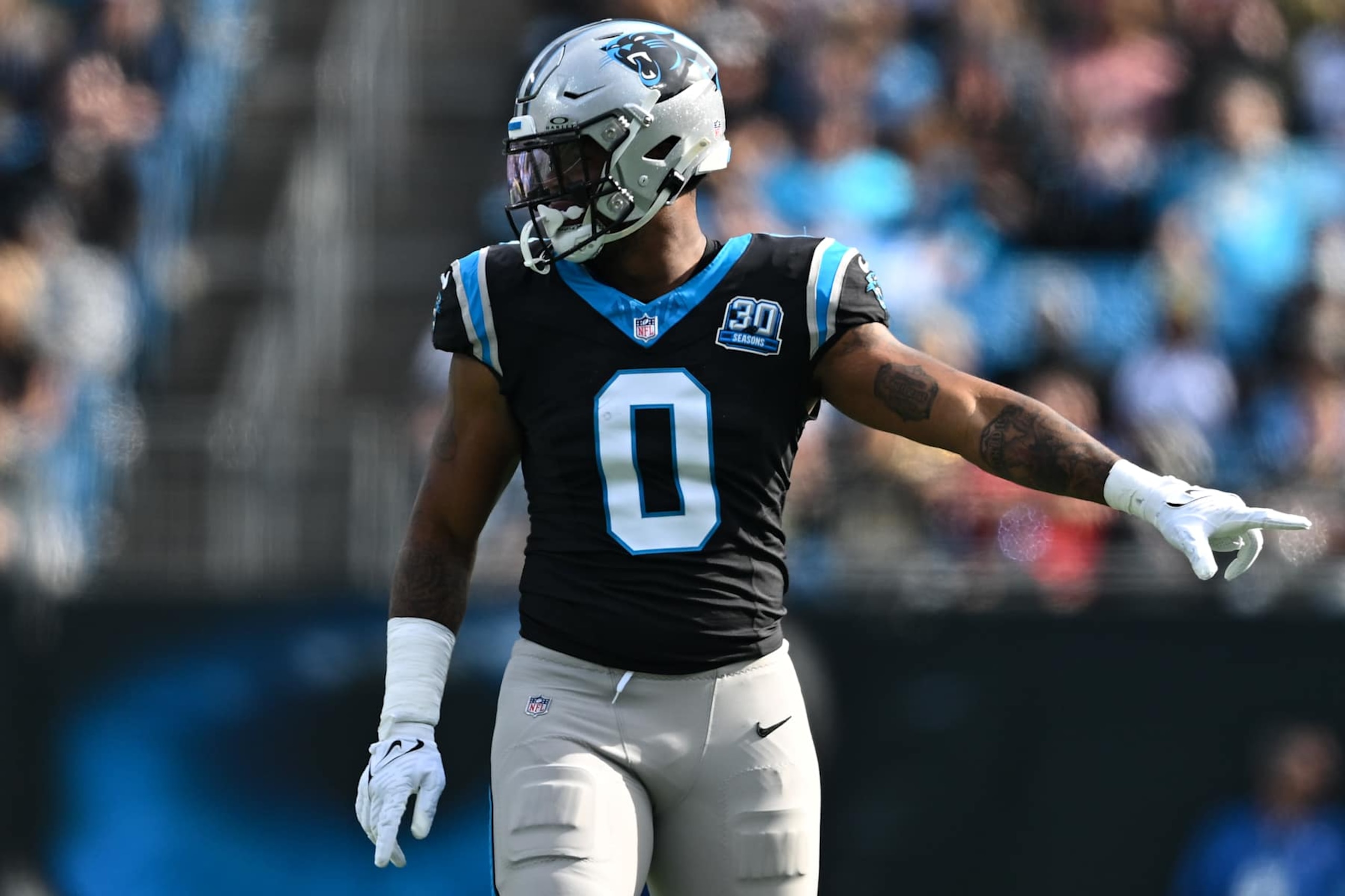 CHARLOTTE, NORTH CAROLINA - NOVEMBER 03: Ja'Tavion Sanders #0 of the Carolina Panthers points during the second quarter of his game against the New Orleans Saints at Bank of America Stadium on November 03, 2024 in Charlotte, North Carolina. (Photo by Matt Kelley/Getty Images)