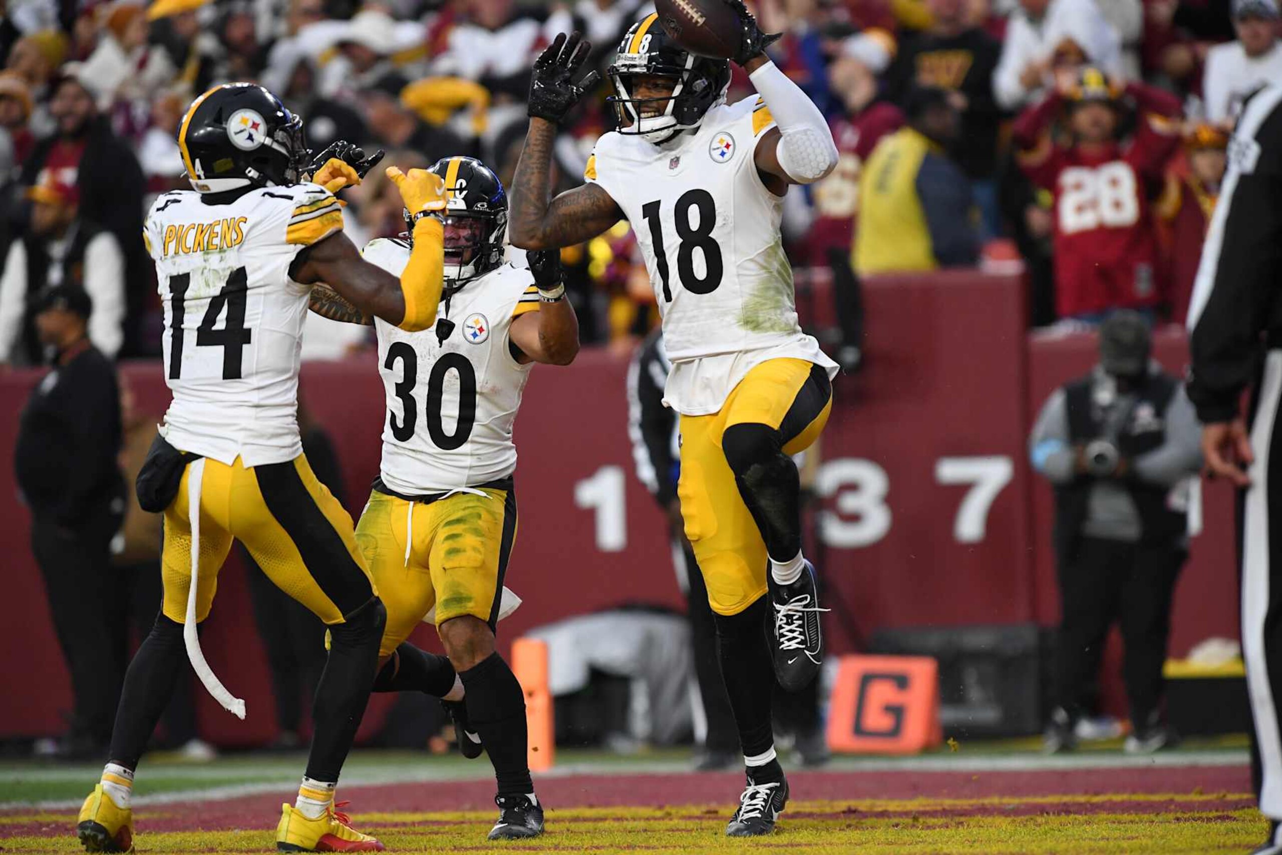 LANDOVER, MD - NOVEMBER 10: Steelers wide receivers Mike Williams (18) and George Pickens (14) celebrate after Williams game-winning touchdown catch during the Pittsburgh Steelers versus Washington Commanders National Football League game at Northwest Stadium on November 10, 2024 in Landover, MD. (Photo by Randy Litzinger/Icon Sportswire via Getty Images)