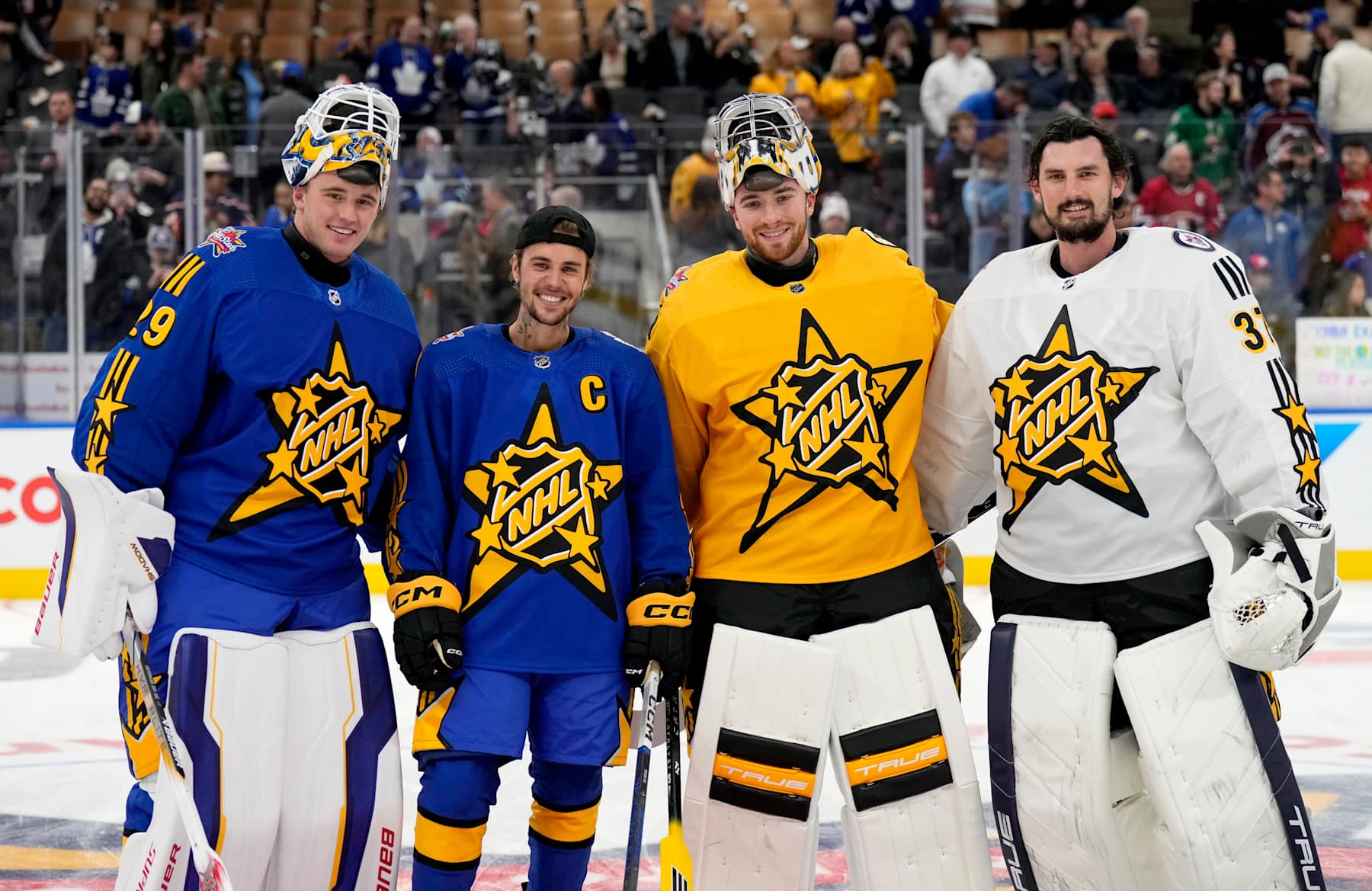 Jake Oettinger, Justin Bieber, Jeremy Swayman and Connor Hellebuyck