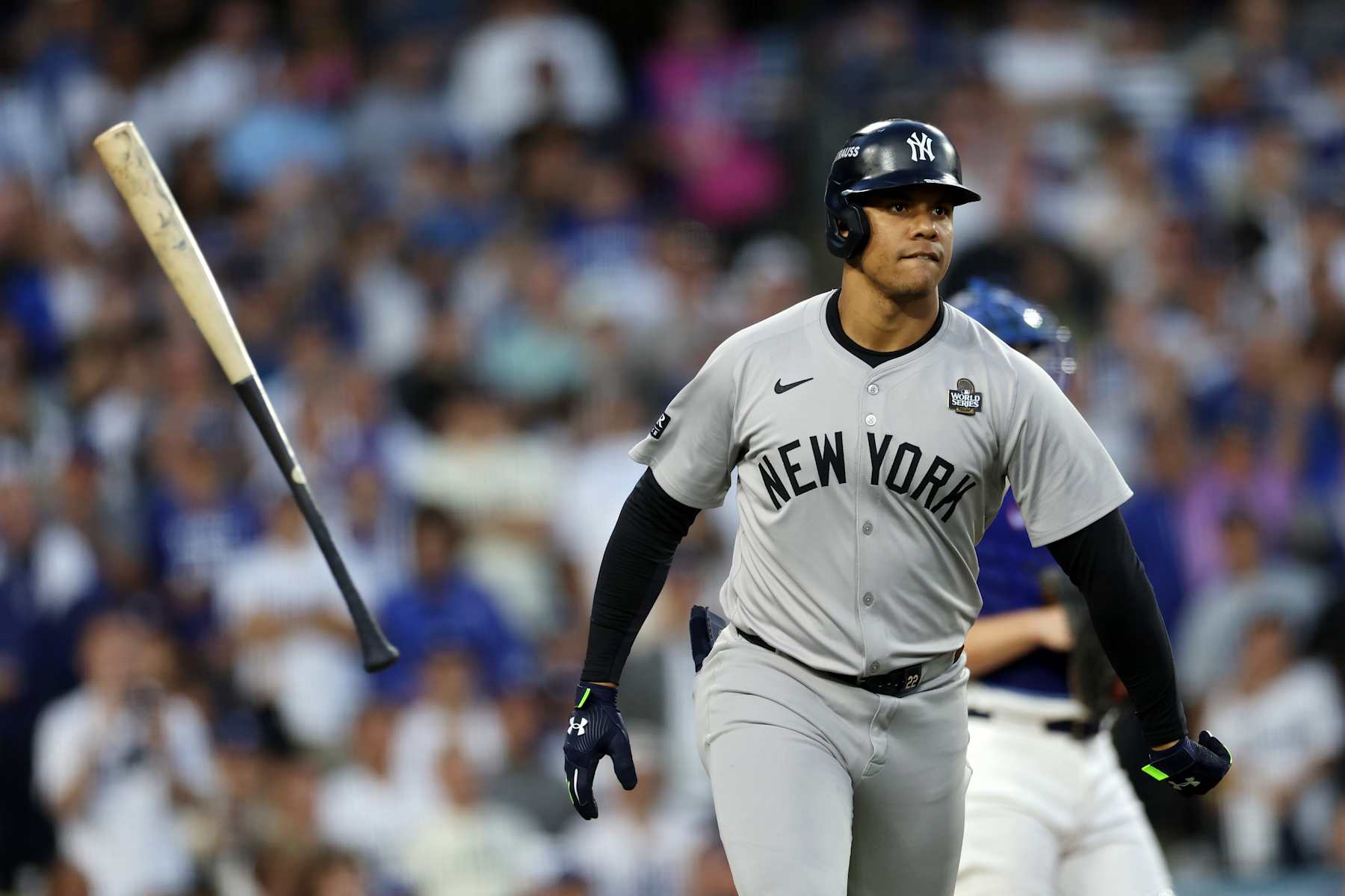 LOS ANGELES, CALIFORNIA - OCTOBER 26: Juan Soto #22 of the New York Yankees flips his bat as he runs the bases after hitting a solo home run against the Los Angeles Dodgers in the third inning during Game Two of the 2024 World Series at Dodger Stadium on October 26, 2024 in Los Angeles, California. (Photo by Harry How/Getty Images)