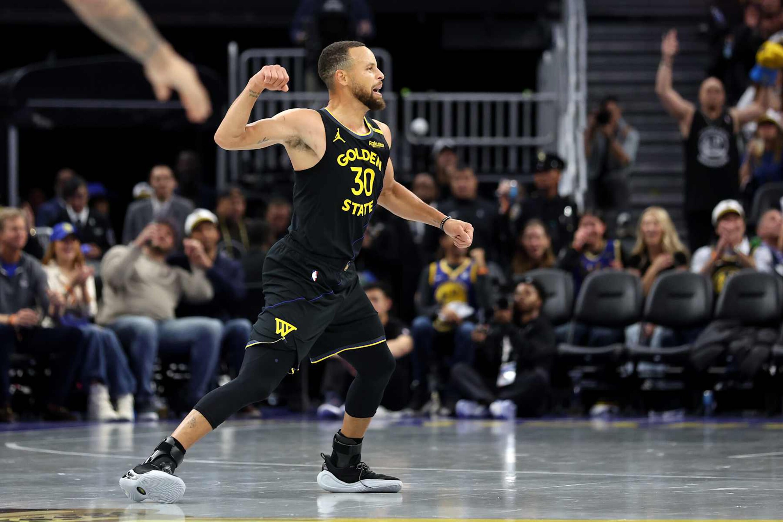 SAN FRANCISCO, CALIFORNIA - NOVEMBER 12: Stephen Curry #30 of the Golden State Warriors reacts after he made a basket against the Dallas Mavericks at Chase Center on November 12, 2024 in San Francisco, California. NOTE TO USER: User expressly acknowledges and agrees that, by downloading and/or using this photograph, user is consenting to the terms and conditions of the Getty Images License Agreement.  (Photo by Ezra Shaw/Getty Images)