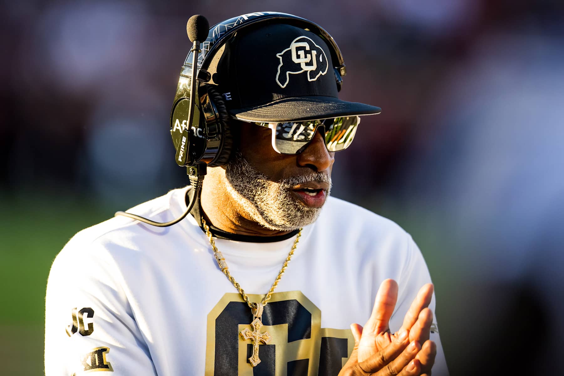 LUBBOCK, TEXAS - NOVEMBER 09: Head coach Deion Sanders of the Colorado Buffaloes claps during the second half of the game against the Texas Tech Red Raiders at Jones AT&T Stadium on November 09, 2024 in Lubbock, Texas. (Photo by John E. Moore III/Getty Images)