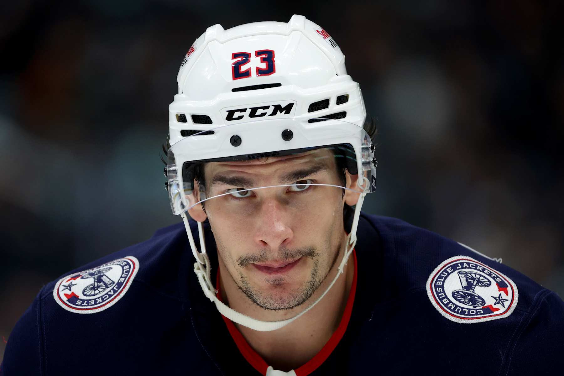 SEATTLE, WASHINGTON - NOVEMBER 12: Sean Monahan #23 of the Columbus Blue Jackets looks on during the third period against the Seattle Kraken at Climate Pledge Arena on November 12, 2024 in Seattle, Washington. (Photo by Steph Chambers/Getty Images)