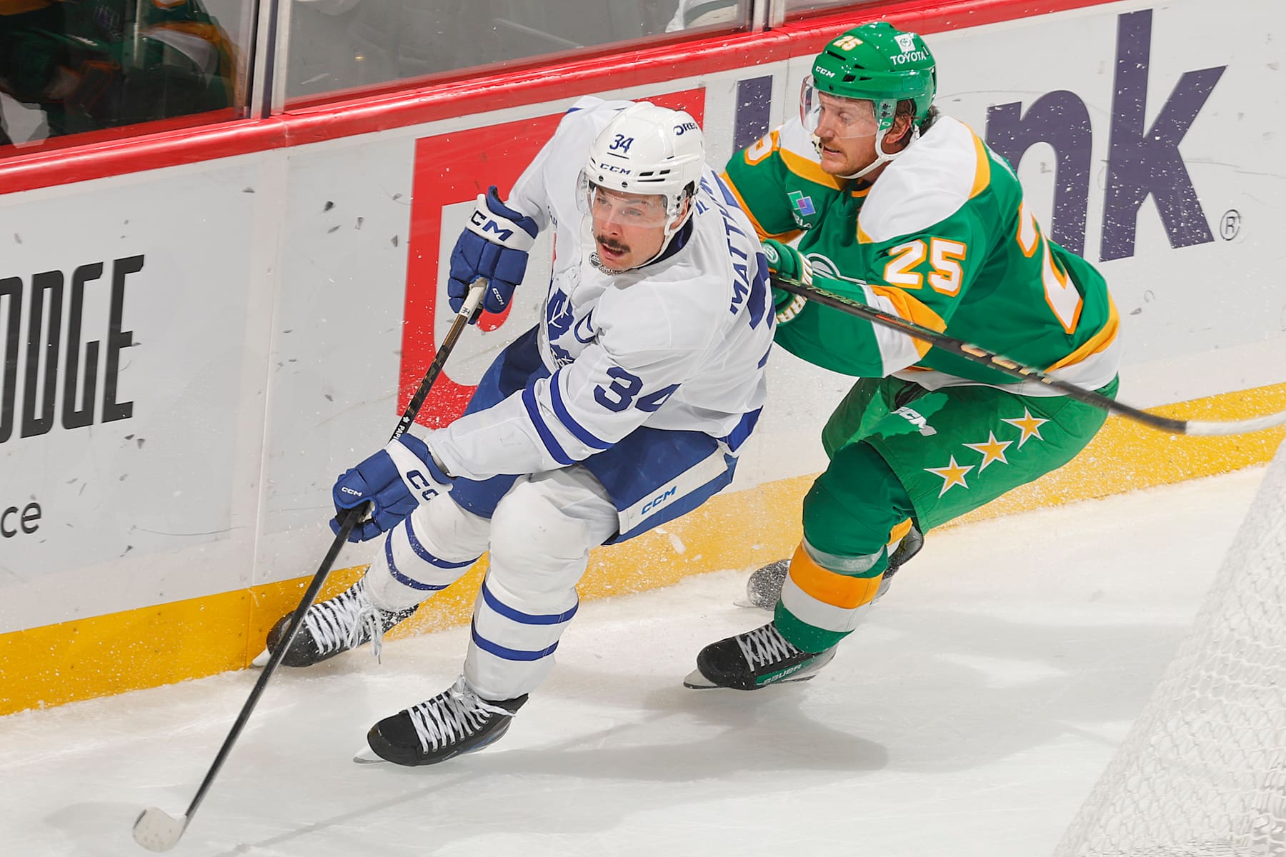 SAINT PAUL, MN - NOVEMBER 3: Jonas Brodin #25 of the Minnesota Wild defends Auston Matthews #34 of the Toronto Maple Leafs during the game at the Xcel Energy Center on November 3, 2024 in Saint Paul, Minnesota. (Photo by Bruce Kluckhohn/NHLI via Getty Images)