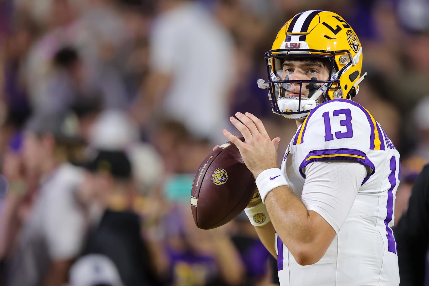 BATON ROUGE, LOUISIANA - NOVEMBER 09: Garrett Nussmeier #13 of the LSU Tigers warms up before a game against the Alabama Crimson Tide at Tiger Stadium on November 09, 2024 in Baton Rouge, Louisiana. (Photo by Jonathan Bachman/Getty Images)