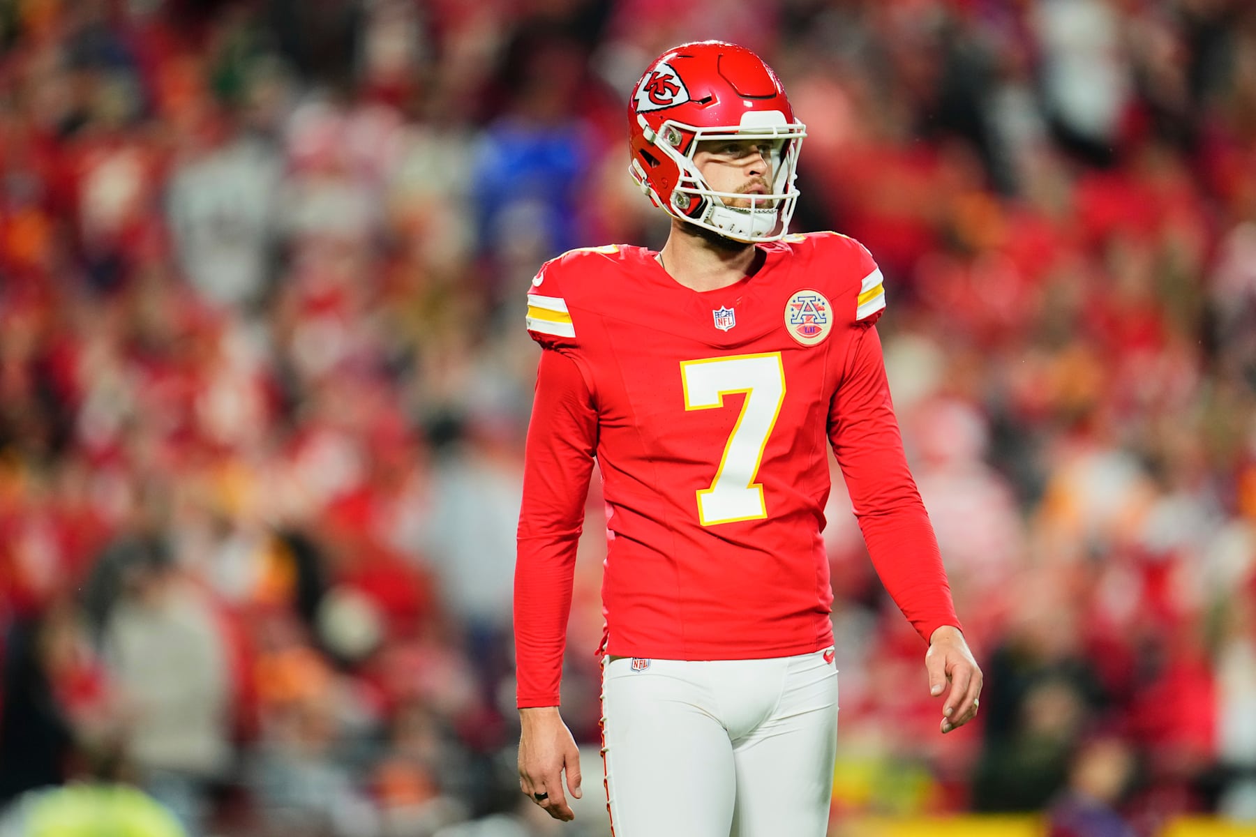 KANSAS CITY, MO - NOVEMBER 04: Harrison Butker #7 of the Kansas City Chiefs walks towards the sideline against the Tampa Bay Buccaneers during the first half of an NFL football game at GEHA Field at Arrowhead Stadium on November 4, 2024 in Kansas City, Missouri. (Photo by Cooper Neill/Getty Images)