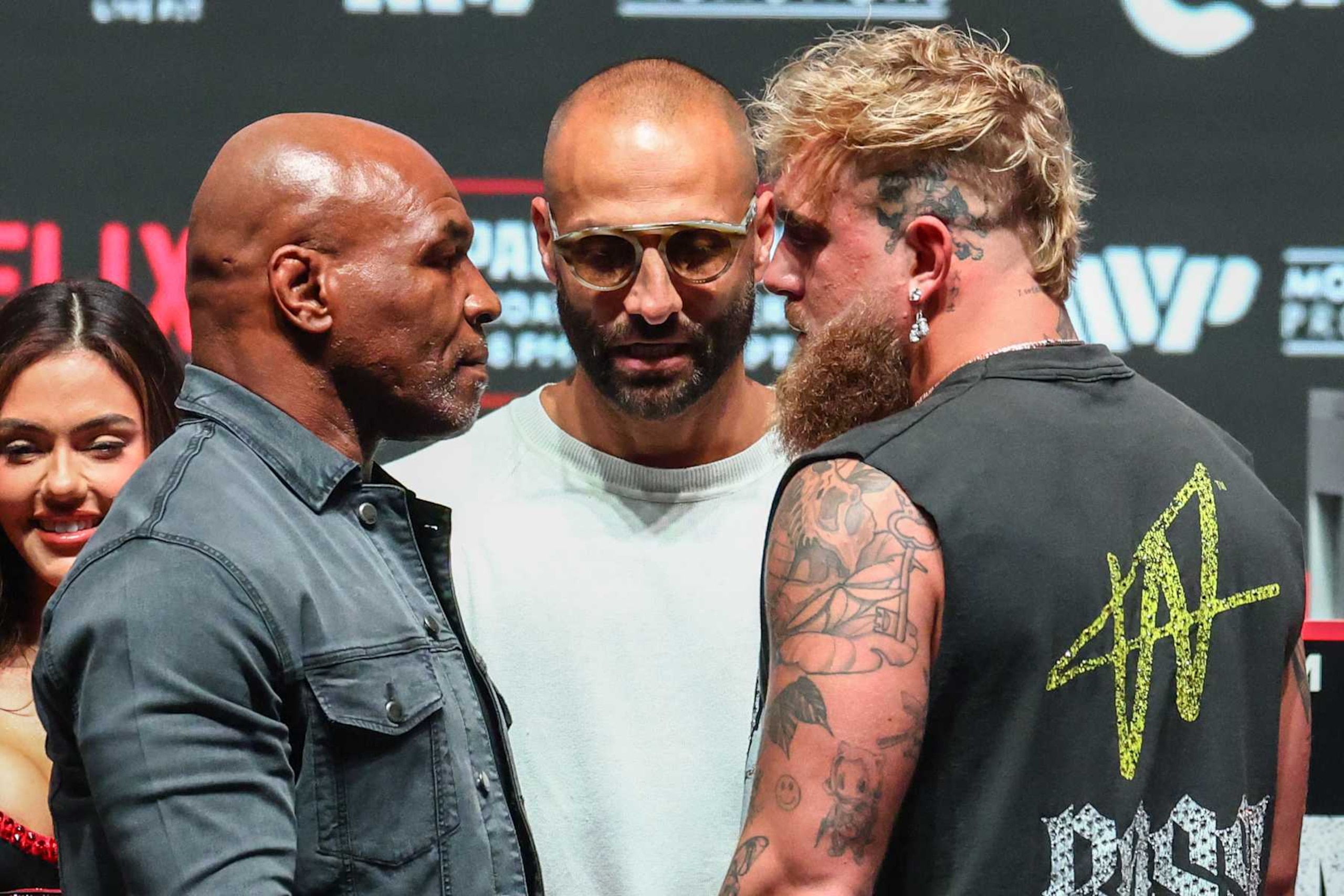 IRVING, TEXAS - NOVEMBER 13: Mike Tyson and Jake Paul pose after the final press conference for their upcoming heavyweight fight at Toyota Music Factory on November 13, 2024 in Irving, Texas. (Photo by Ed Mulholland/Getty Images)