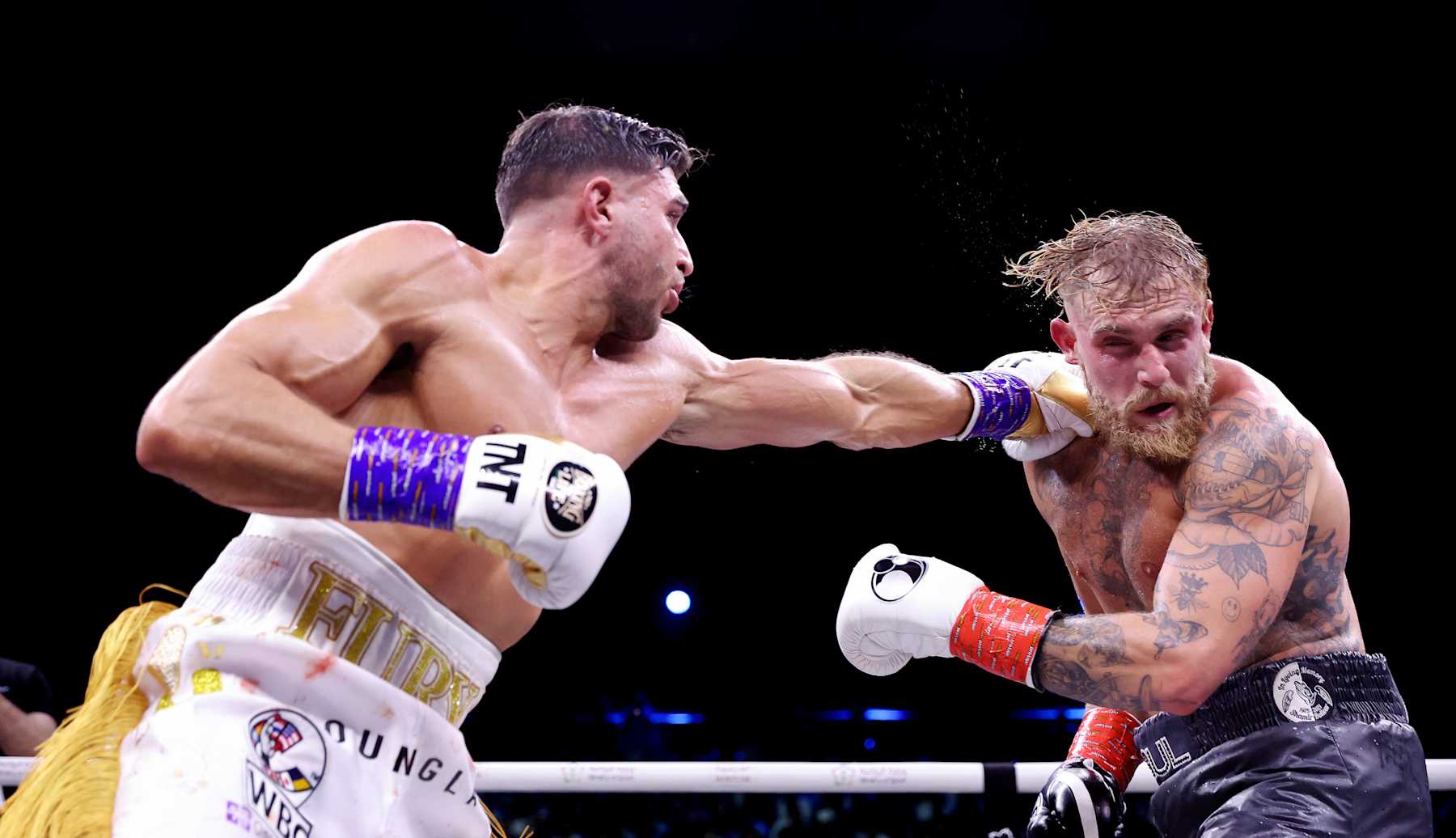 Tommy Fury punches Jake Paul