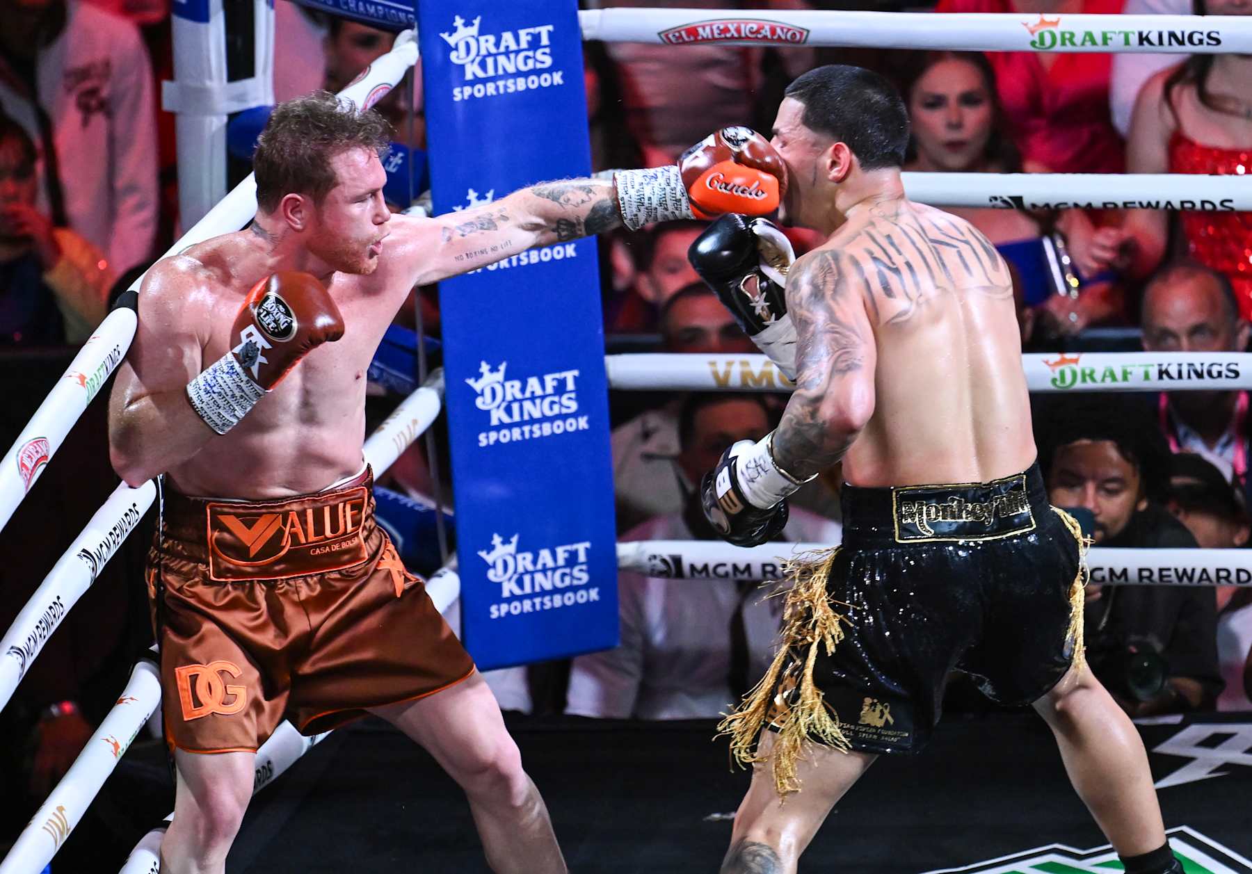 Saul 'Canelo' Alvarez throws a punch at Edgar Berlanga.