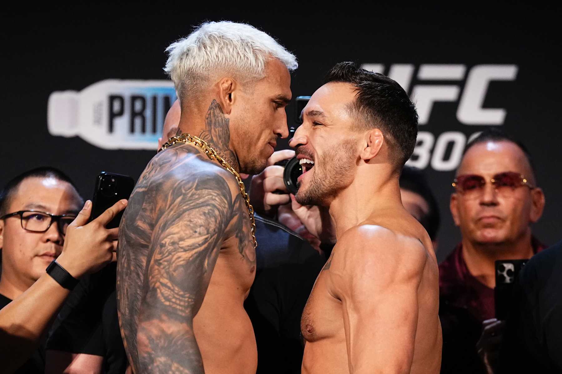 NEW YORK, NEW YORK - NOVEMBER 15: (L-R) Opponents Charles Oliveira of Brazil and Michael Chandler face off during the UFC 309 ceremonial weigh-in at The Theater at Madison Square Garden on November 15, 2024 in New York City. (Photo by Jeff Bottari/Zuffa LLC)