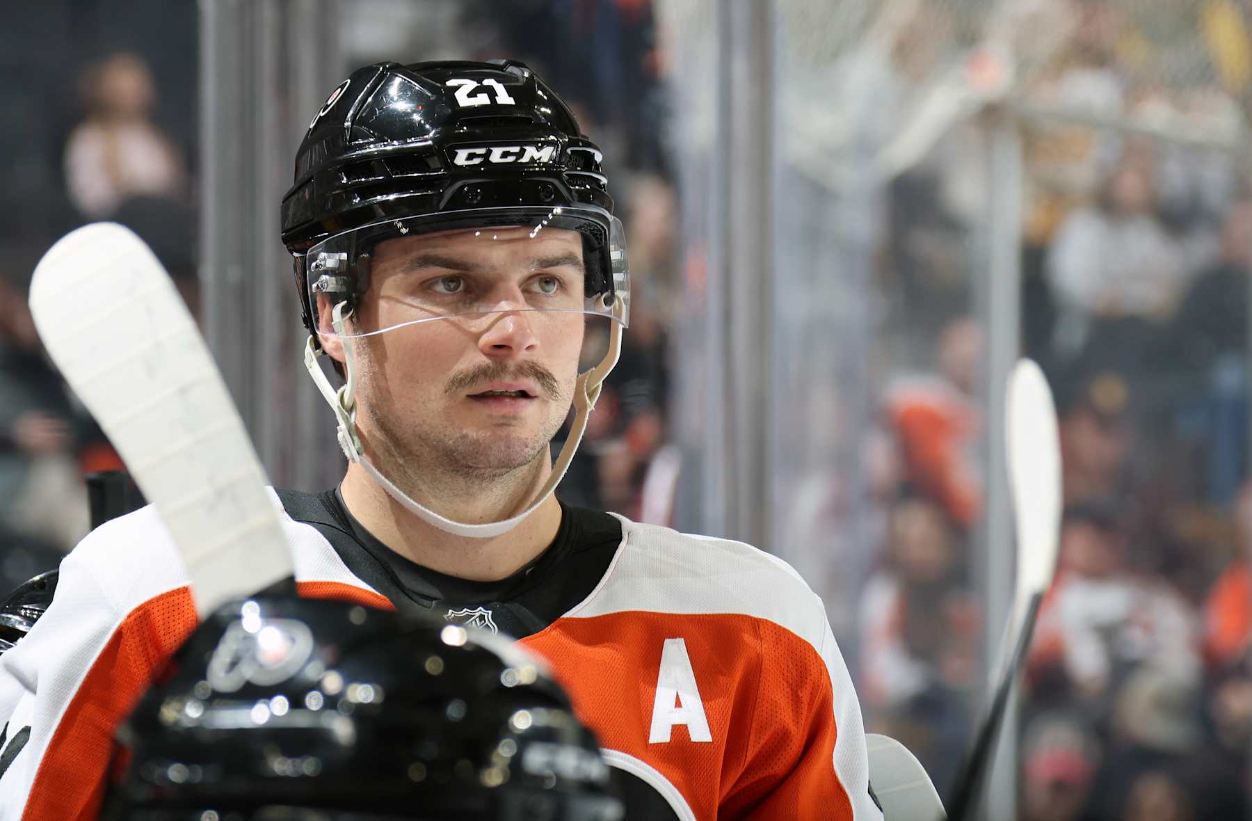 PHILADELPHIA, PENNSYLVANIA - NOVEMBER 02:  Scott Laughton #21 of the Philadelphia Flyers looks on from the bench during the first period against the Boston Bruins at the Wells Fargo Center on November 2, 2024 in Philadelphia, Pennsylvania.  (Photo by Len Redkoles/NHLI via Getty Images)
