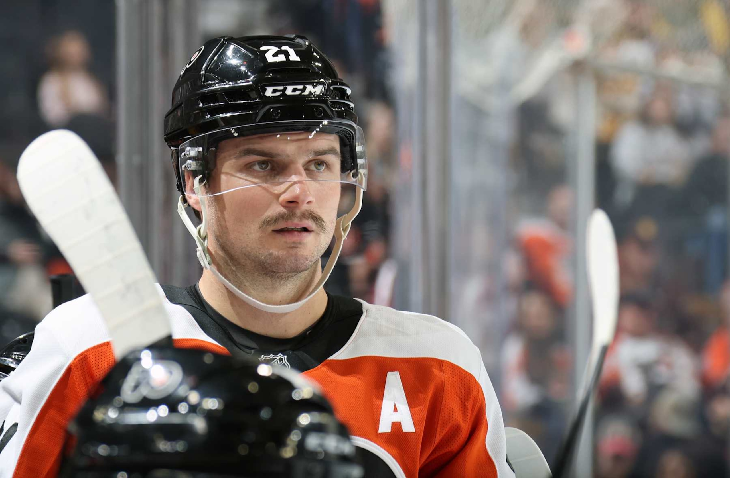 PHILADELPHIA, PENNSYLVANIA - NOVEMBER 02:  Scott Laughton #21 of the Philadelphia Flyers looks on from the bench during the first period against the Boston Bruins at the Wells Fargo Center on November 2, 2024 in Philadelphia, Pennsylvania.  (Photo by Len Redkoles/NHLI via Getty Images)