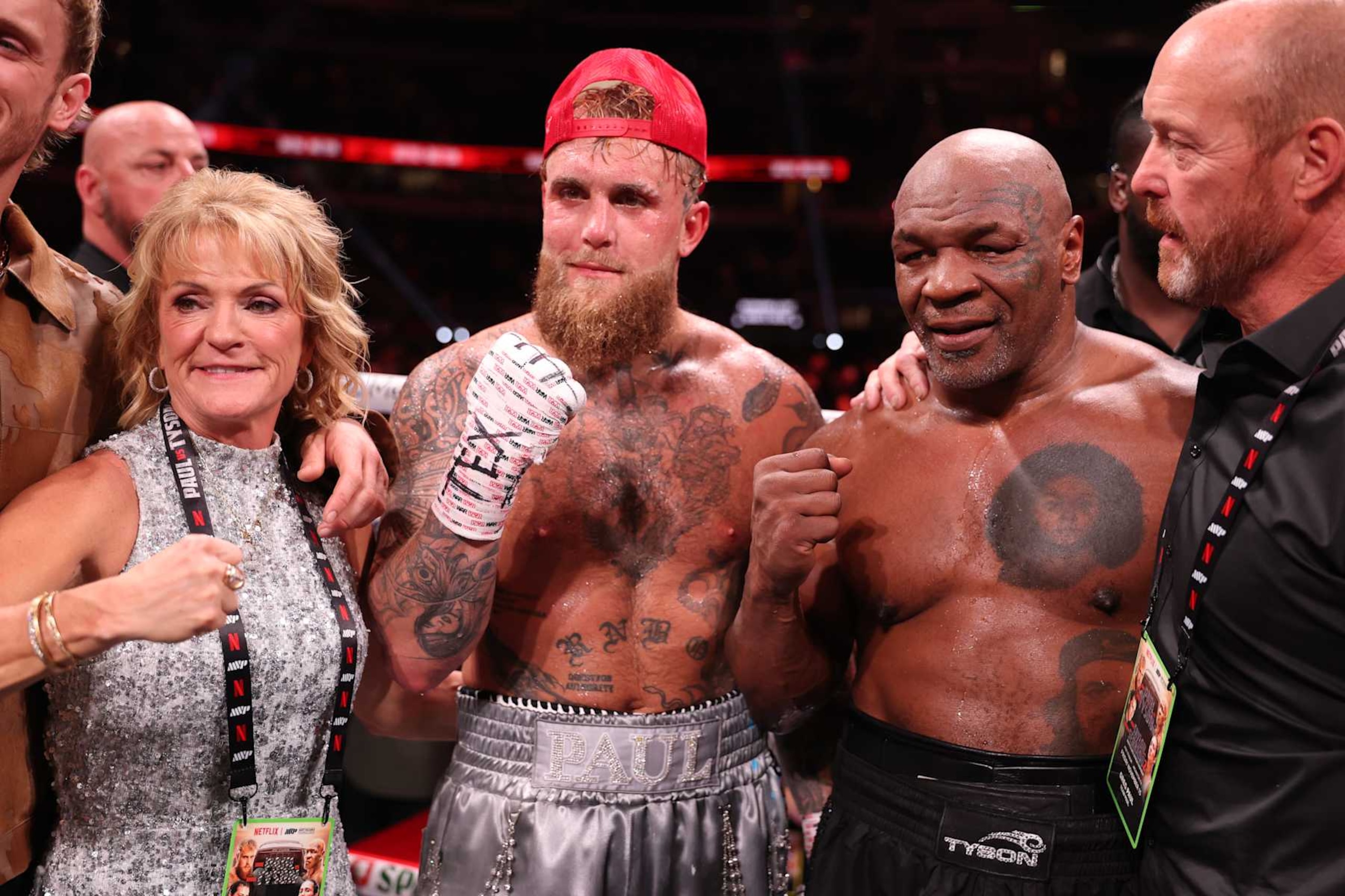 ARLINGTON, TEXAS - NOVEMBER 15: (L-R) Jake Paul announced as winner against Mike Tyson during LIVE On Netflix: Jake Paul vs. Mike Tyson at AT&T Stadium on November 15, 2024 in Arlington, Texas. (Photo by Al Bello/Getty Images for Netflix © 2024)