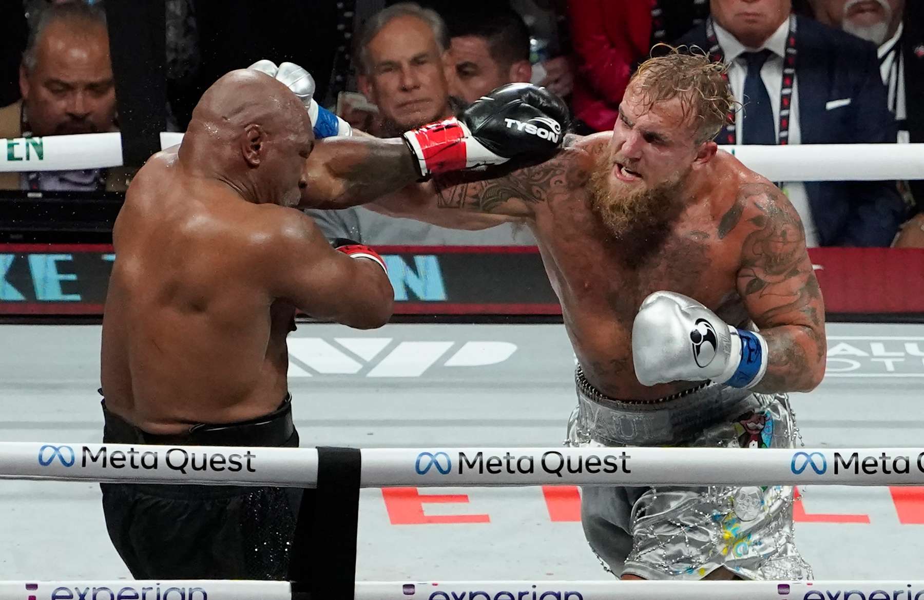 Jake Paul lands a punch against Mike Tyson