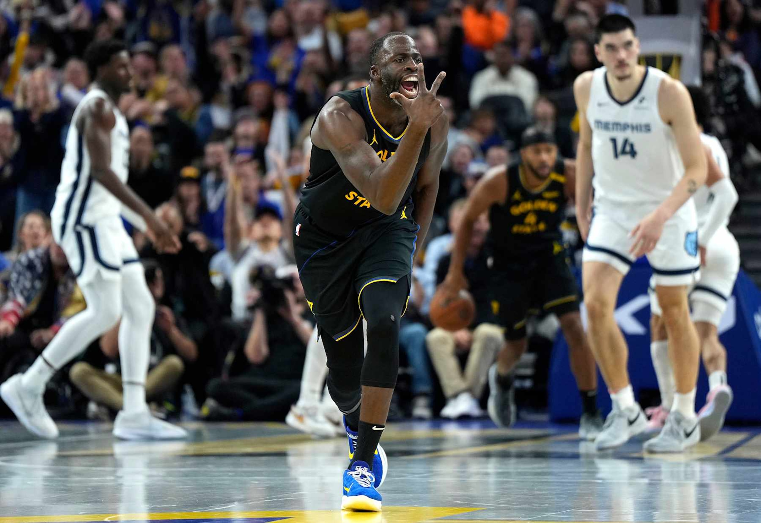 SAN FRANCISCO, CALIFORNIA - NOVEMBER 15: Draymond Green #23 of the Golden State Warriors reacts after making a three-point shot against the Memphis Grizzlies in the fourth quarter during the Emirates NBA Cup game at Chase Center on November 15, 2024 in San Francisco, California. NOTE TO USER: User expressly acknowledges and agrees that, by downloading and or using this photograph, User is consenting to the terms and conditions of the Getty Images License Agreement. (Photo by Thearon W. Henderson/Getty Images)