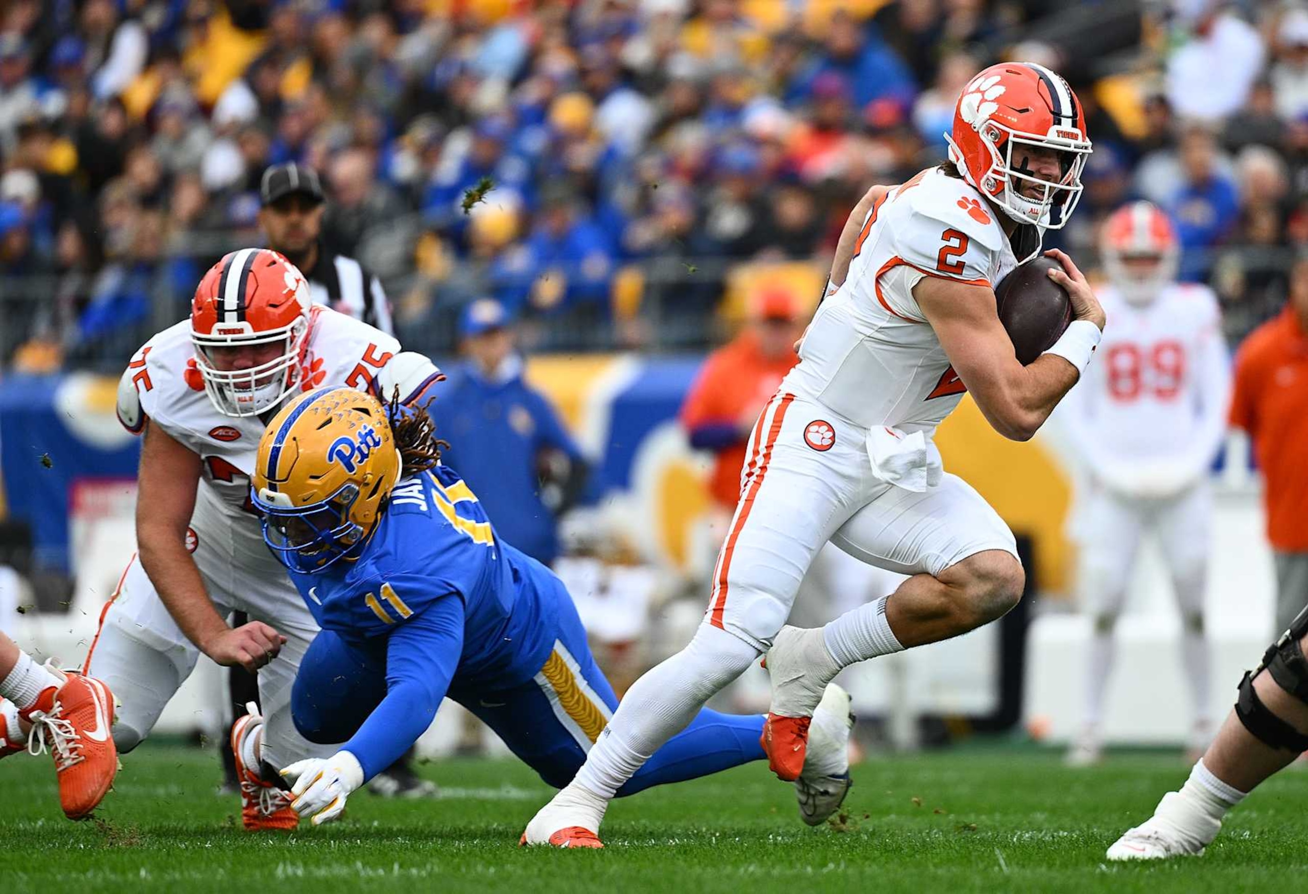 PITTSBURGH, PENNSYLVANIA - NOVEMBER 16: Cade Klubnik #2 of the Clemson Tigers scrambles in the first quarter during the game against the Pittsburgh Panthers at Acrisure Stadium on November 16, 2024 in Pittsburgh, Pennsylvania. (Photo by Justin Berl/Getty Images) PITTSBURGH, PENNSYLVANIA - NOVEMBER 16: Cade Klubnik #2 of the Clemson Tigers scrambles in the first quarter during the game against the Pittsburgh Panthers at Acrisure Stadium on November 16, 2024 in Pittsburgh, Pennsylvania. (Photo by Justin Berl/Getty Images)