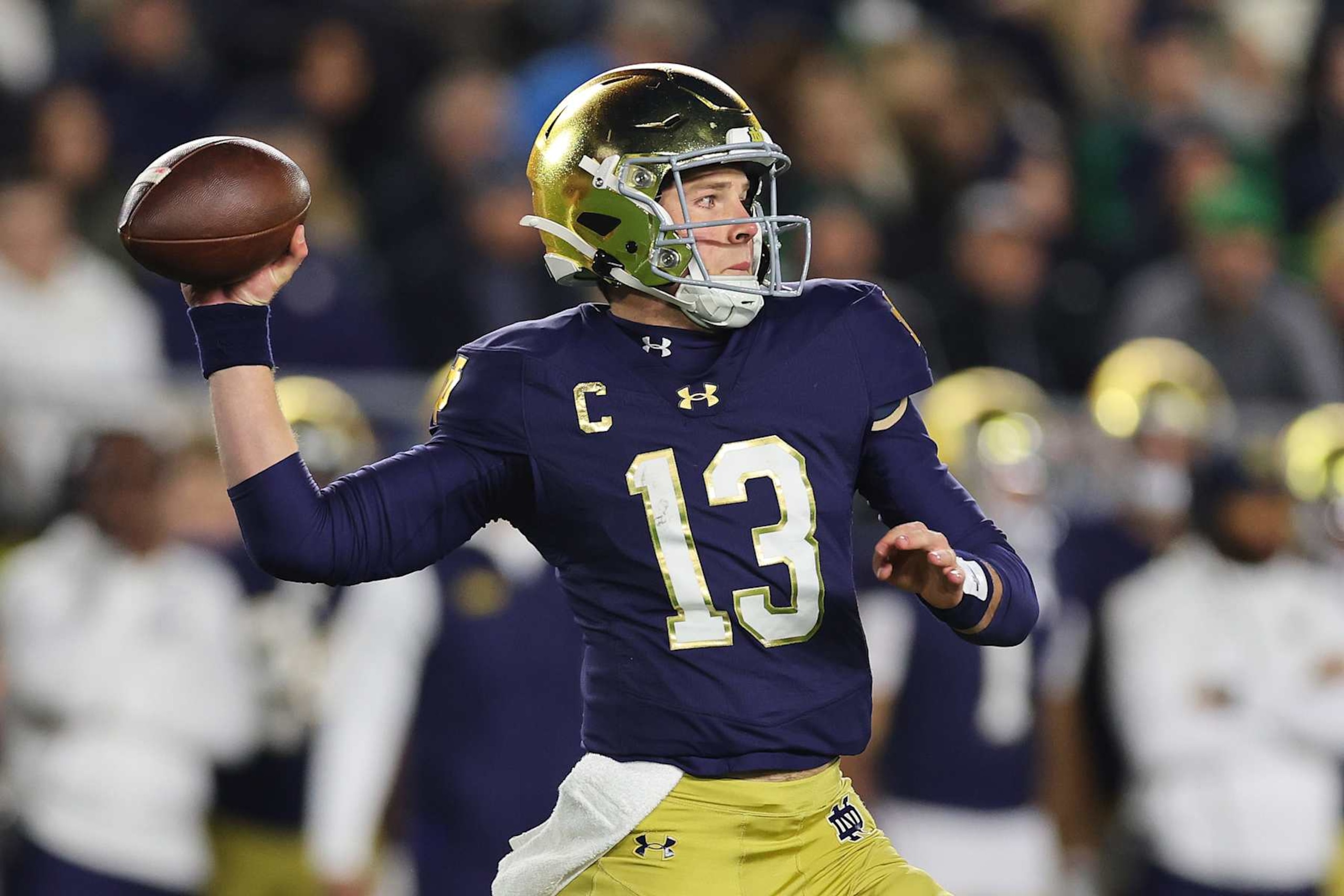 SOUTH BEND, INDIANA - NOVEMBER 09: Riley Leonard #13 of the Notre Dame Fighting Irish throws a pass against the Florida State Seminoles during the first half at Notre Dame Stadium on November 09, 2024 in South Bend, Indiana. (Photo by Michael Reaves/Getty Images) SOUTH BEND, INDIANA - NOVEMBER 09: Riley Leonard #13 of the Notre Dame Fighting Irish throws a pass against the Florida State Seminoles during the first half at Notre Dame Stadium on November 09, 2024 in South Bend, Indiana. (Photo by Michael Reaves/Getty Images)