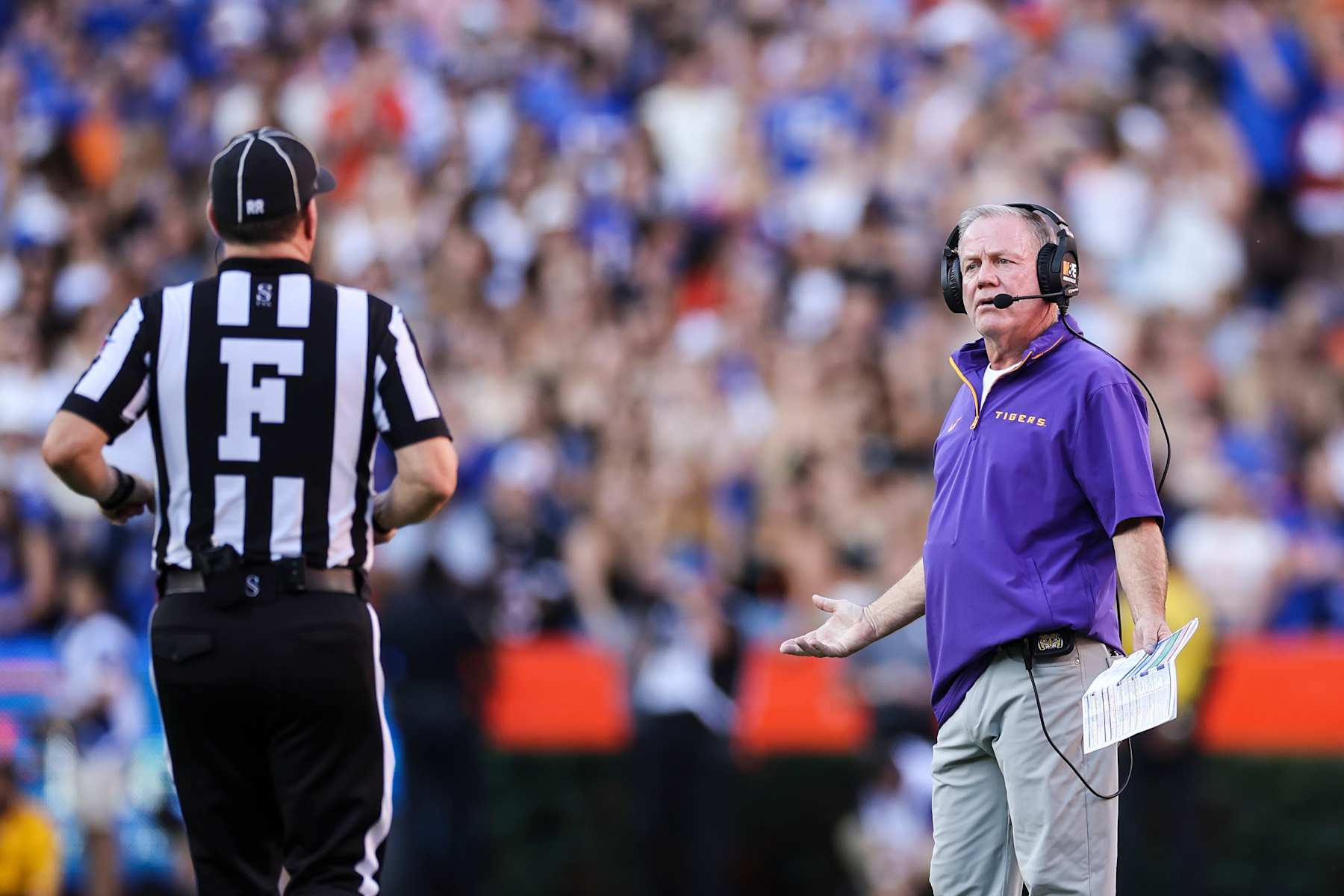 GAINESVILLE, FLORIDA - NOVEMBER 16: Head coach Brian Kelly of the LSU Tigers reacts during the first half of a game against the Florida Gators at Ben Hill Griffin Stadium on November 16, 2024 in Gainesville, Florida. (Photo by James Gilbert/Getty Images)