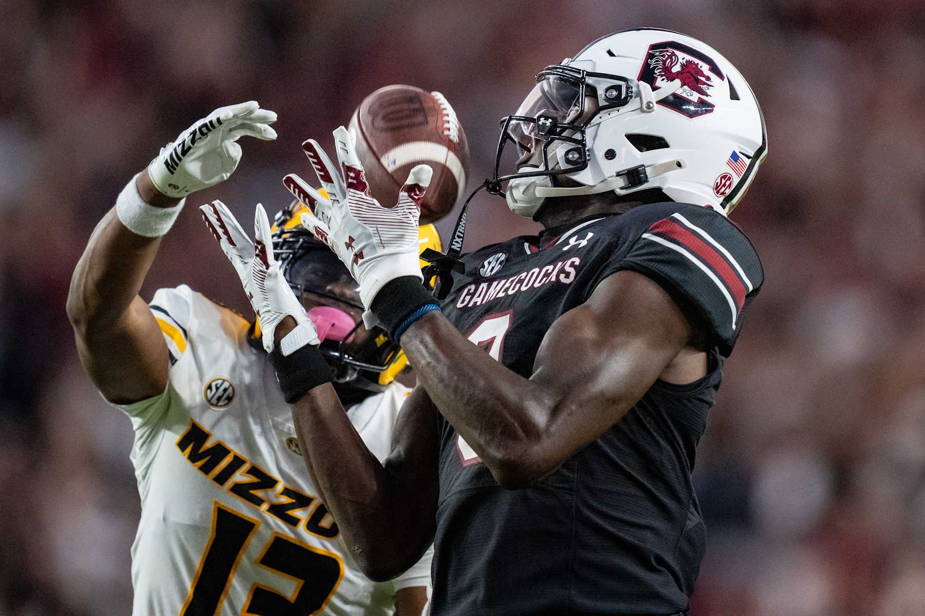 COLUMBIA, SOUTH CAROLINA - NOVEMBER 16: Nyck Harbor #8 of the South Carolina Gamecocks makes a catch while covered by Daylan Carnell #13 of the Missouri Tigers in the second quarter during their game at Williams-Brice Stadium on November 16, 2024 in Columbia, South Carolina. (Photo by Jacob Kupferman/Getty Images)