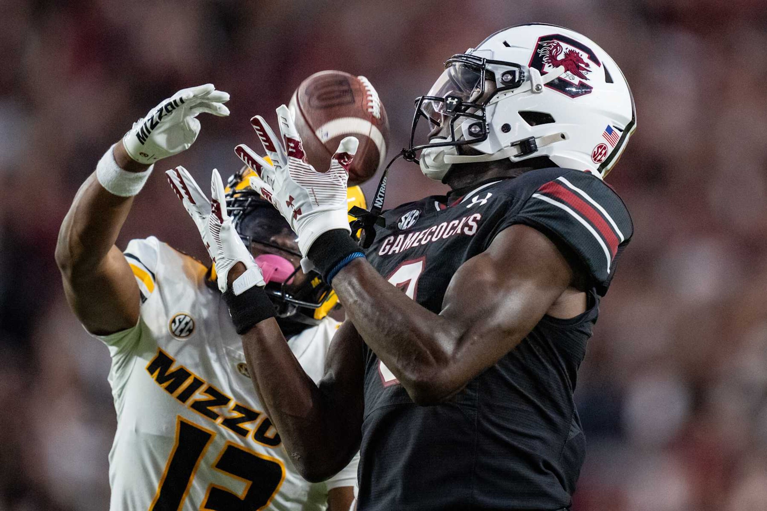 COLUMBIA, SOUTH CAROLINA - NOVEMBER 16: Nyck Harbor #8 of the South Carolina Gamecocks makes a catch while covered by Daylan Carnell #13 of the Missouri Tigers in the second quarter during their game at Williams-Brice Stadium on November 16, 2024 in Columbia, South Carolina. (Photo by Jacob Kupferman/Getty Images)