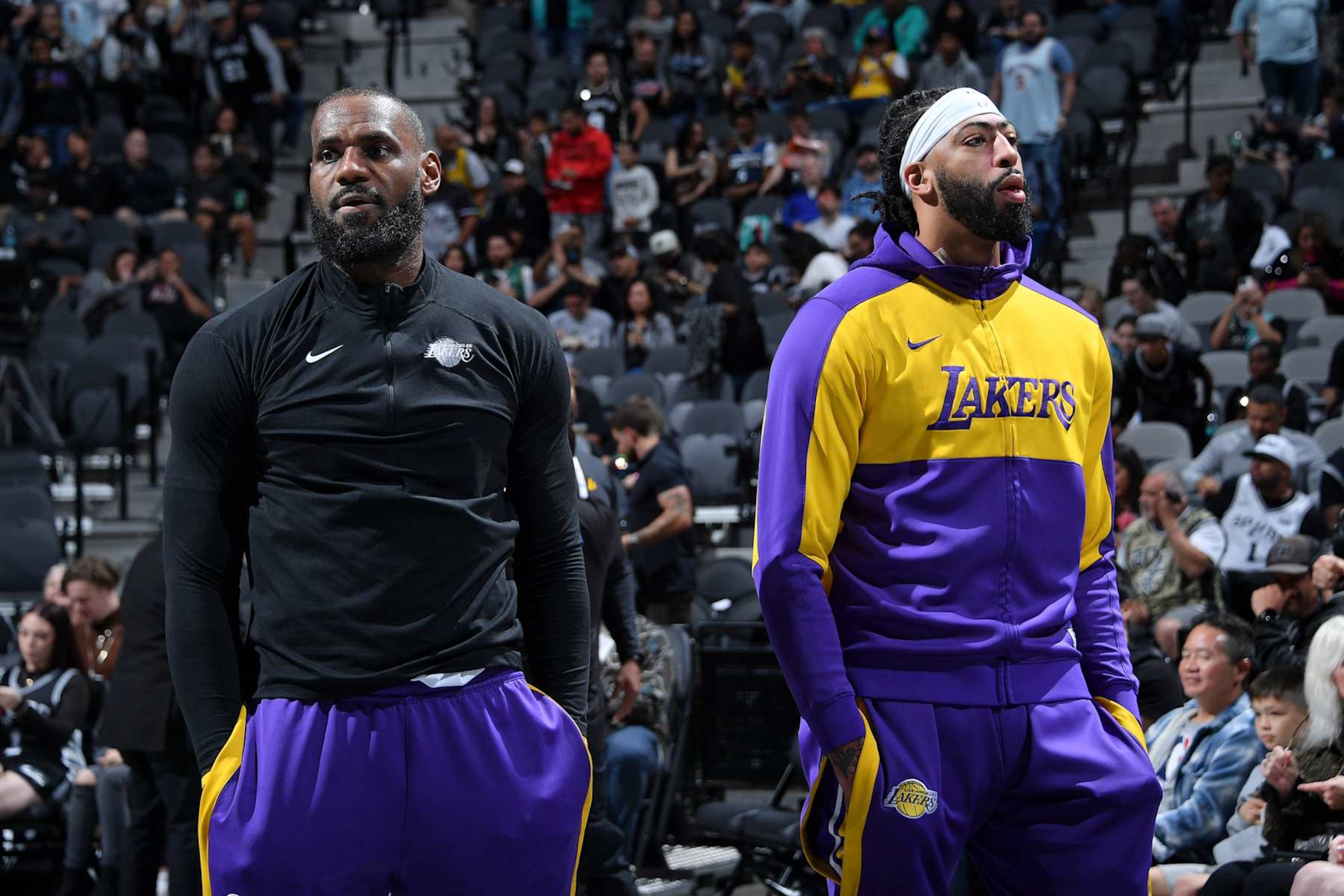 SAN ANTONIO, TX - OCTOBER 22:  Anthony Davis #3 and LeBron James #23 of the Los Angeles Lakers stand for the National Anthem before the NBA Cup game against the San Antonio Spurs on October 22, 2024 at the Frost Bank Center in San Antonio, Texas. NOTE TO USER: User expressly acknowledges and agrees that, by downloading and or using this photograph, user is consenting to the terms and conditions of the Getty Images License Agreement. Mandatory Copyright Notice: Copyright 2024 NBAE (Photos by Michael Gonzales/NBAE via Getty Images)