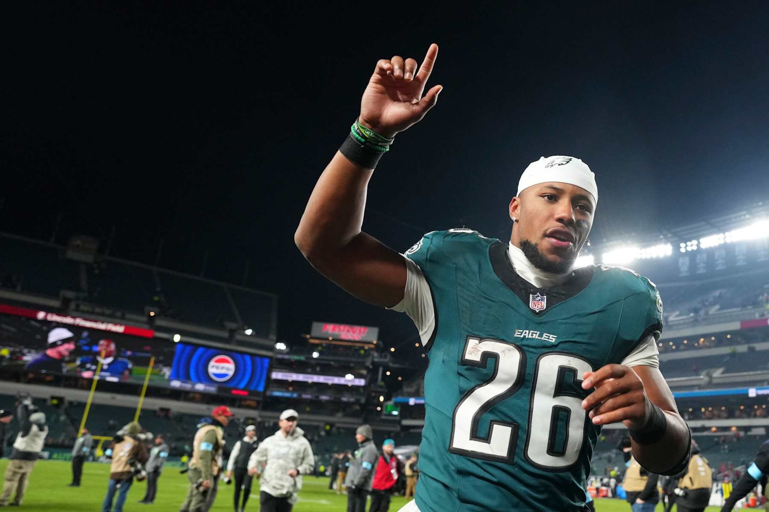 PHILADELPHIA, PENNSYLVANIA - NOVEMBER 14: Saquon Barkley #26 of the Philadelphia Eagles reacts against the Washington Commanders at Lincoln Financial Field on November 14, 2024 in Philadelphia, Pennsylvania. (Photo by Mitchell Leff/Getty Images)