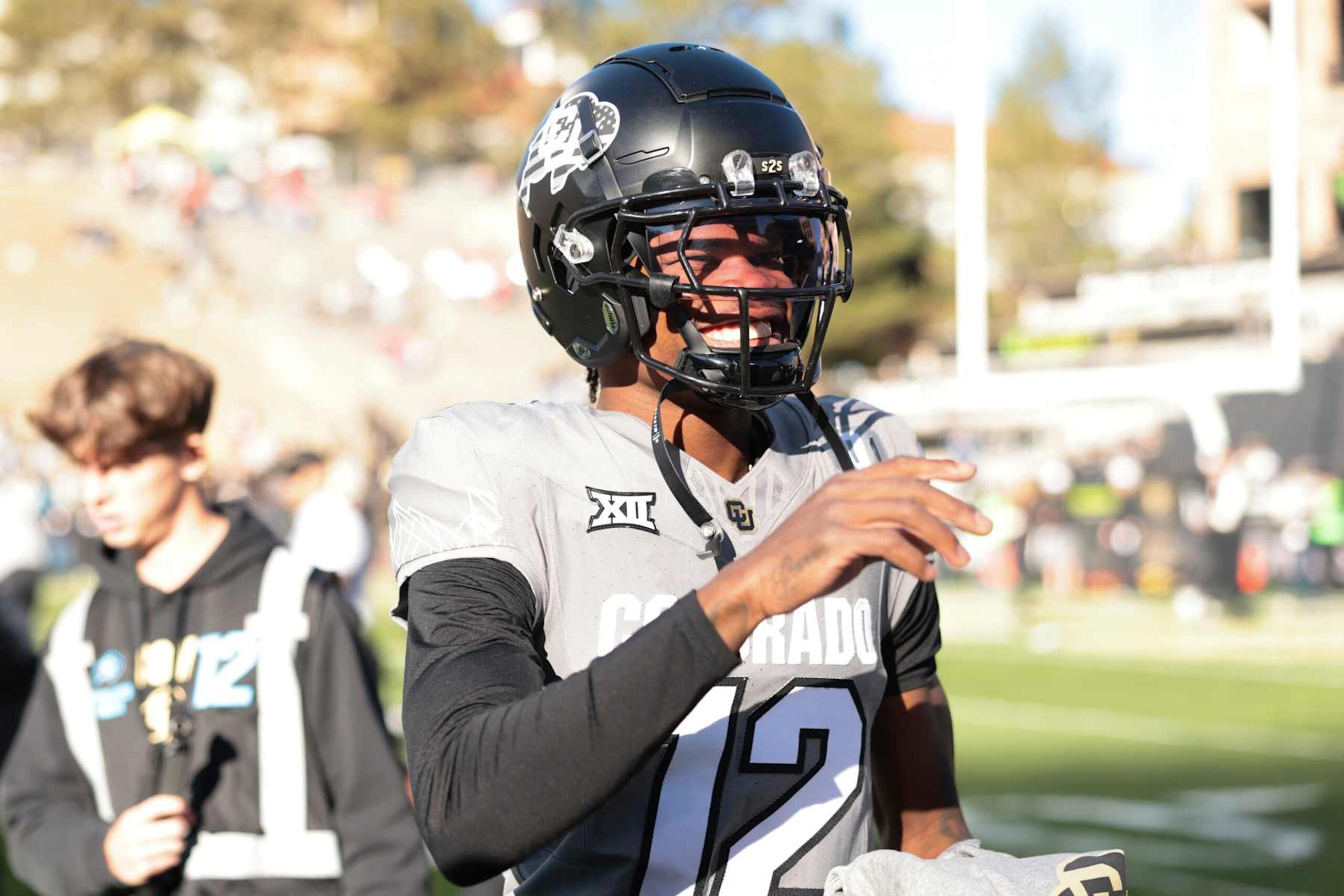 BOULDER, COLORADO - NOVEMBER 16: Travis Hunter #12 of Colorado Buffaloes reacts on the field during warm ups prior to the game against the Utah Utes at Folsom Field on November 16, 2024 in Boulder, Colorado. (Photo by Andrew Wevers/Getty Images)