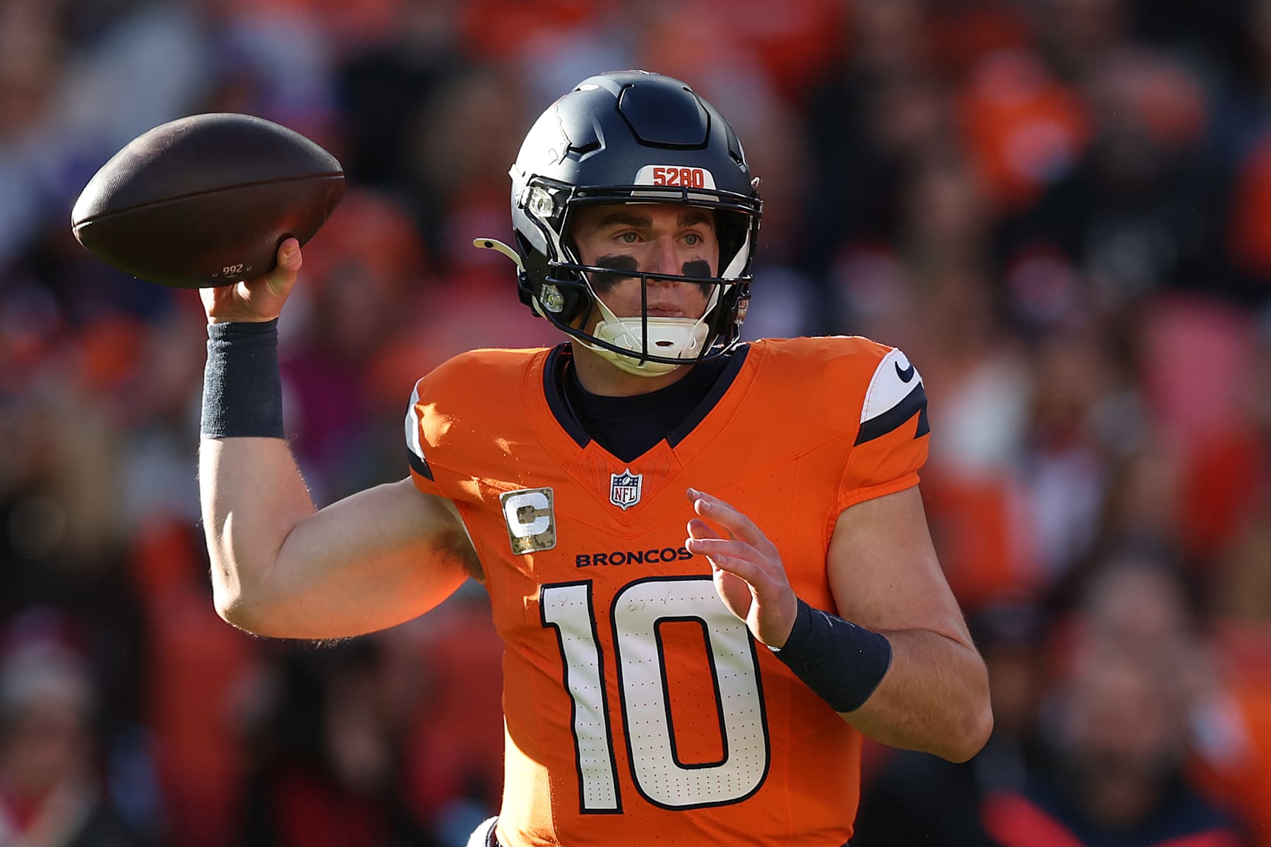 DENVER, COLORADO - NOVEMBER 17: Quarterback Bo Nix #10 of the Denver Broncos throws a pass during the first quarter against the Atlanta Falcons at Empower Field At Mile High on November 17, 2024 in Denver, Colorado. (Photo by Matthew Stockman/Getty Images)