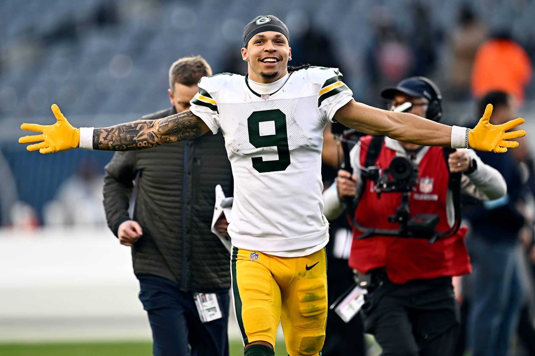 CHICAGO, ILLINOIS - NOVEMBER 17: Christian Watson #9 of the Green Bay Packers celebrates after his team's 20-19 win against the Chicago Bears at Soldier Field on November 17, 2024 in Chicago, Illinois. (Photo by Quinn Harris/Getty Images)