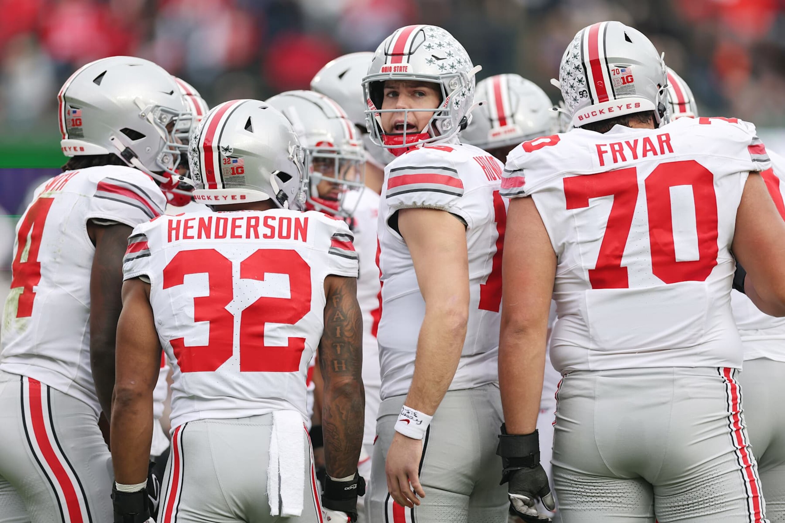 CHICAGO, ILLINOIS - NOVEMBER 16: Will Howard #18 of the Ohio State Buckeyes huddles with the offense against the Northwestern Wildcats during the first half at Wrigley Field on November 16, 2024 in Chicago, Illinois. (Photo by Michael Reaves/Getty Images)
