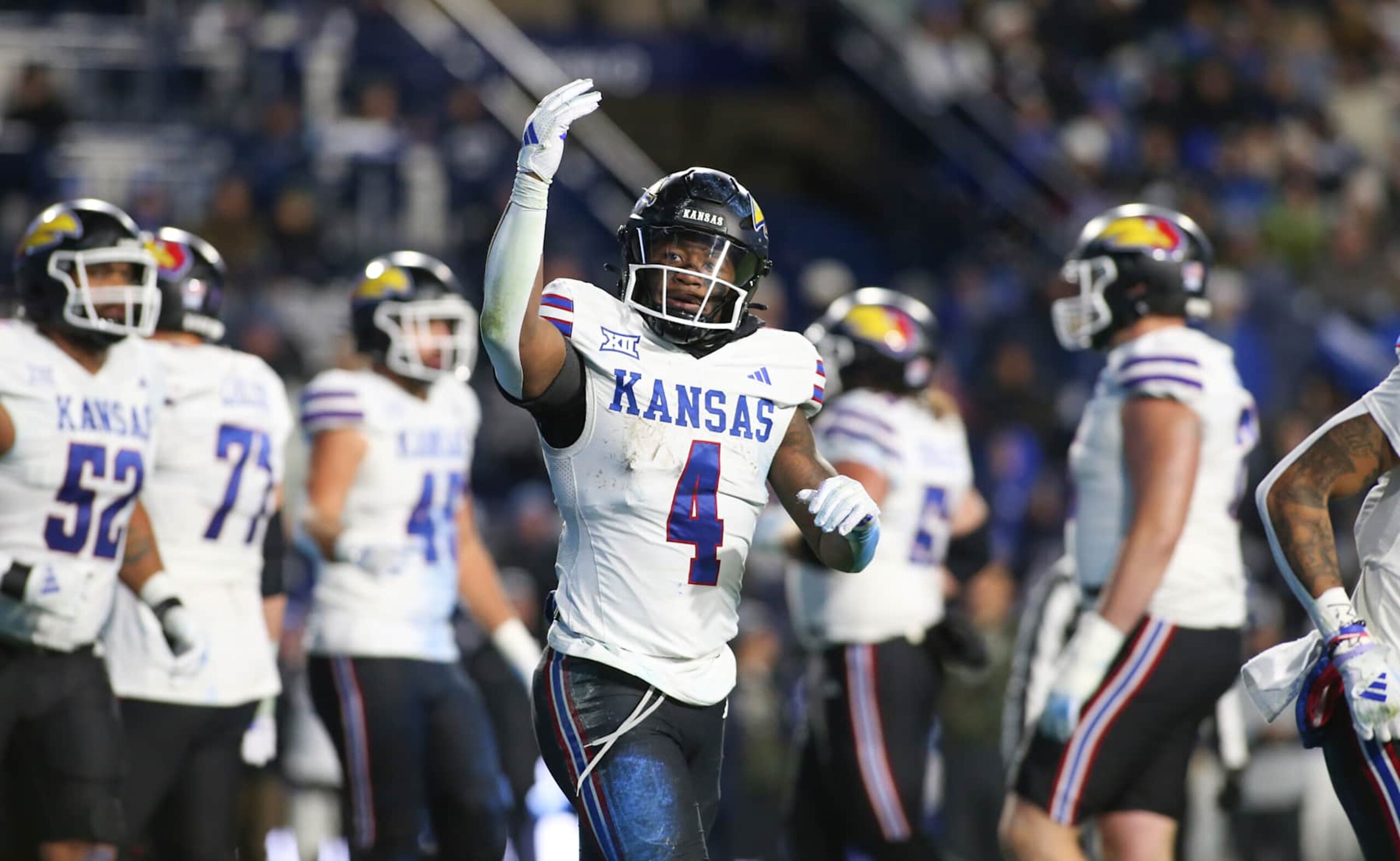 PROVO, UT - NOVEMBER 16:  Devin Neal #4 of the Kansas Jayhawks celebrates scoring a touchdown against the Brigham Young Cougars during the second half of their game at LaVell Edwards Stadium on November 16, 2024 in Provo, Utah.(Photo by Chris Gardner/Getty Images)