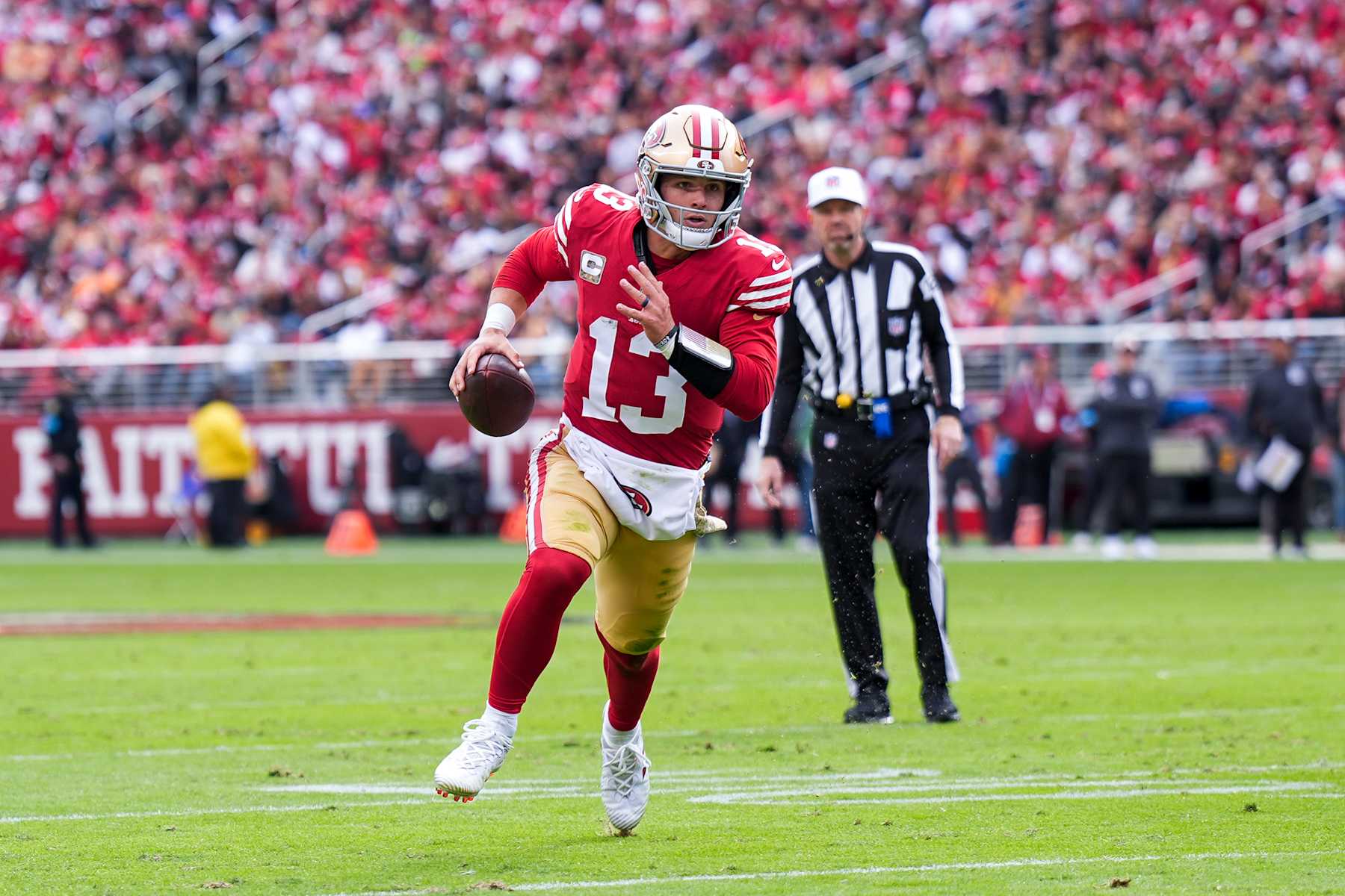 SANTA CLARA, CALIFORNIA - NOVEMBER 17: Brock Purdy #13 of the San Francisco 49ers runs the ball for a touchdown in the first quarter of a game against the Seattle Seahawks at Levi's Stadium on November 17, 2024 in Santa Clara, California. (Photo by Thearon W. Henderson/Getty Images)