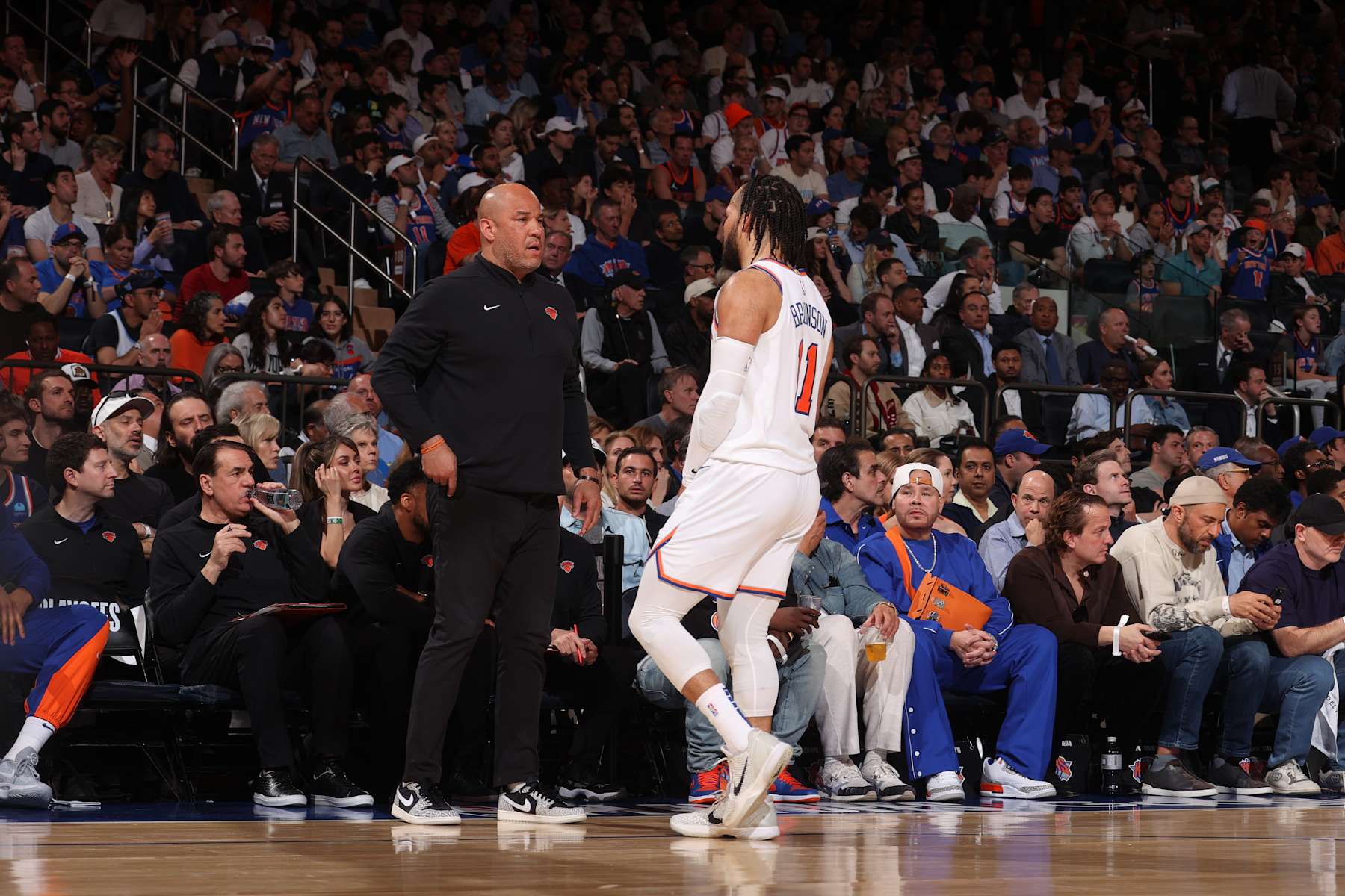 NEW YORK, NY - MAY 19: Rick Brunson talks to Jalen Brunson #11 of the New York Knicks during the game against the Indiana Pacers during Round 2 Game 7 of the 2024 NBA Playoffs on May 19, 2024 at Madison Square Garden in New York City, New York. NOTE TO USER: User expressly acknowledges and agrees that, by downloading and or using this photograph, User is consenting to the terms and conditions of the Getty Images License Agreement. Mandatory Copyright Notice: Copyright 2024 NBAE (Photo by Nathaniel S. Butler/NBAE via Getty Images)