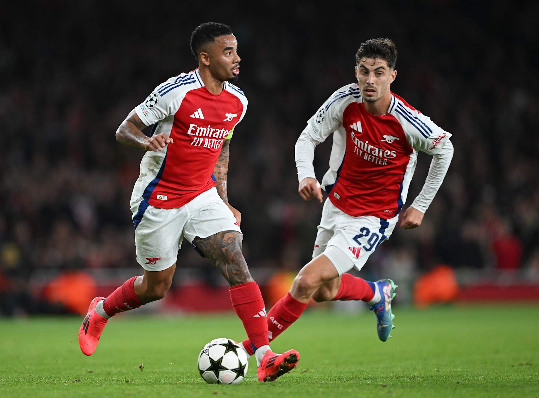 LONDON, ENGLAND - OCTOBER 22: Gabriel Jesus of Arsenal runs with the ball as Kai Havertz looks on during the UEFA Champions League 2024/25 League Phase MD3 match between Arsenal FC and FC Shakhtar Donetsk at Emirates Stadium on October 22, 2024 in London, England. (Photo by Shaun Botterill/Getty Images)
