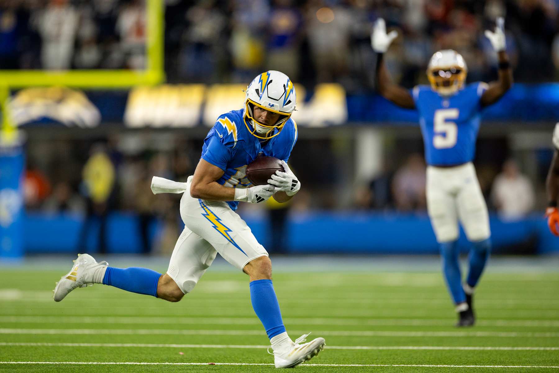 INGLEWOOD, CALIFORNIA - NOVEMBER 17: Ladd McConkey #15 of the Los Angeles Chargers completes a catch and runs with the ball during an NFL Football game against the Cincinnati Bengals at SoFi Stadium on November 17, 2024 in Inglewood, California. (Photo by Michael Owens/Getty Images)
