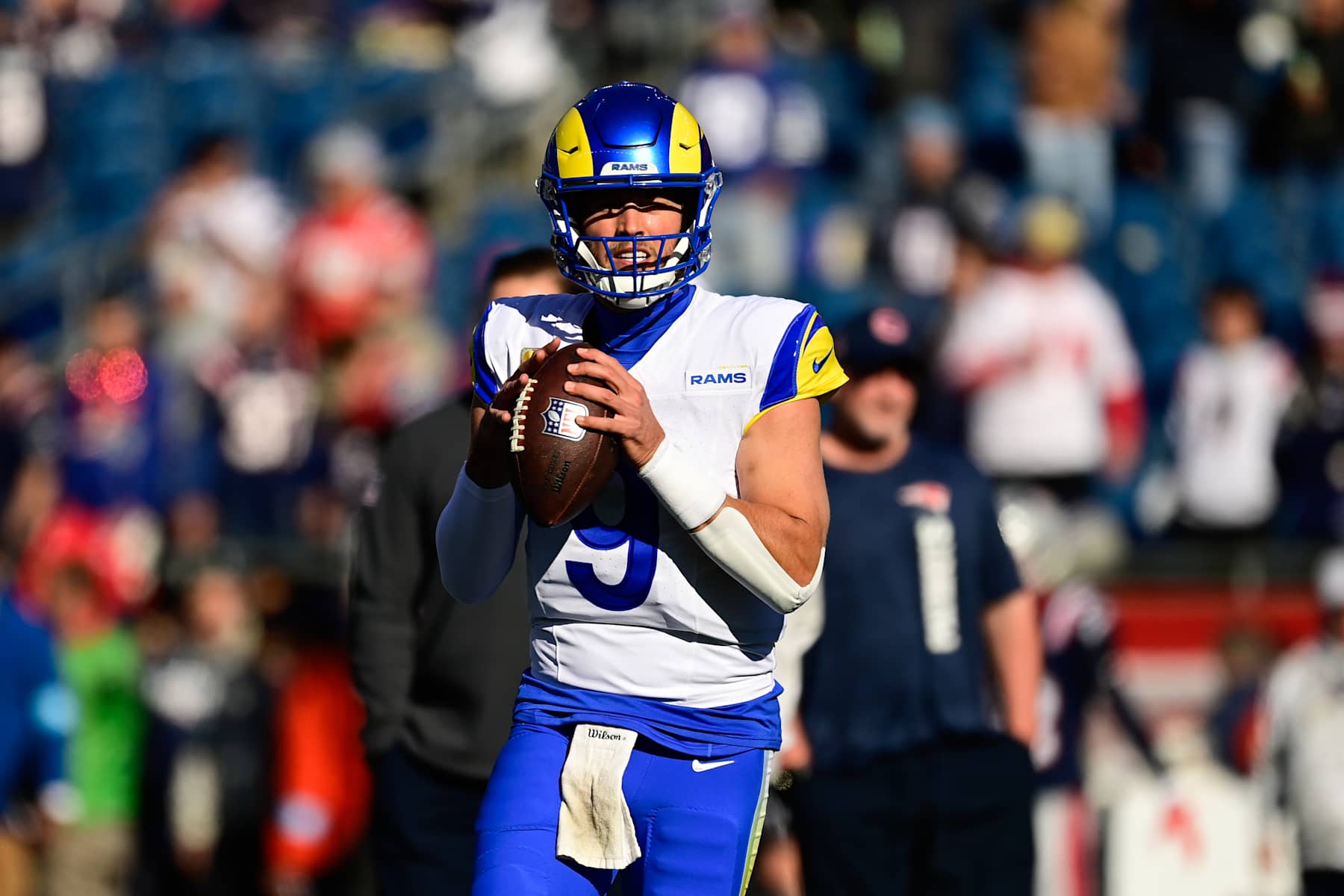 FOXBOROUGH, MASSACHUSETTS - NOVEMBER 17: Quarterback Matthew Stafford #9 of the Los Angeles Rams warms up prior to a game against the New England Patriots at Gillette Stadium on November 17, 2024 in Foxborough, Massachusetts. (Photo by Billie Weiss/Getty Images)