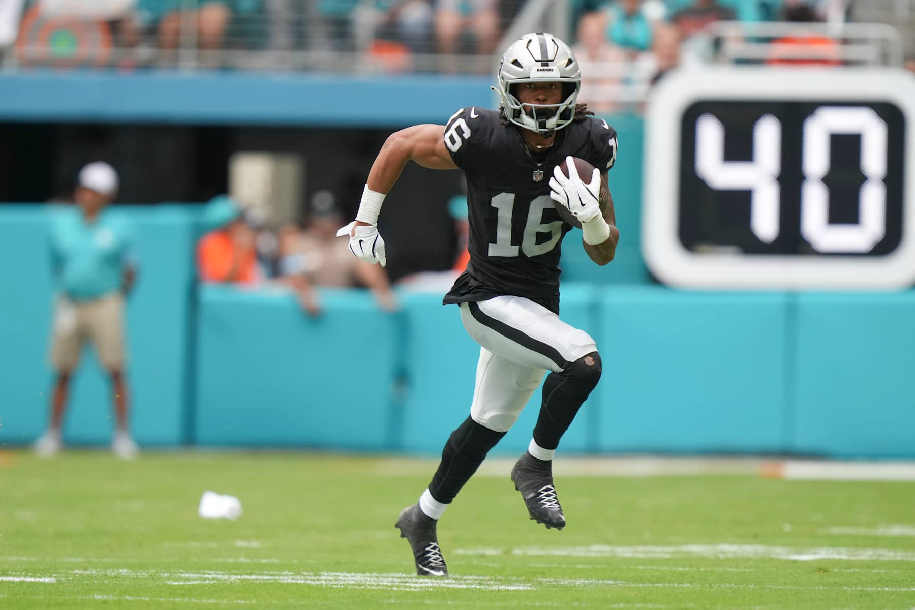 MIAMI GARDENS, FL - NOVEMBER 17: Las Vegas Raiders wide receiver Jakobi Meyers (16) runs after a catch during the game between the Las Vegas Raiders and the Miami Dolphins on Sunday, November 17, 2024 at Hard Rock Stadium in Miami Gardens, Fla. (Photo by Peter Joneleit/Icon Sportswire via Getty Images)