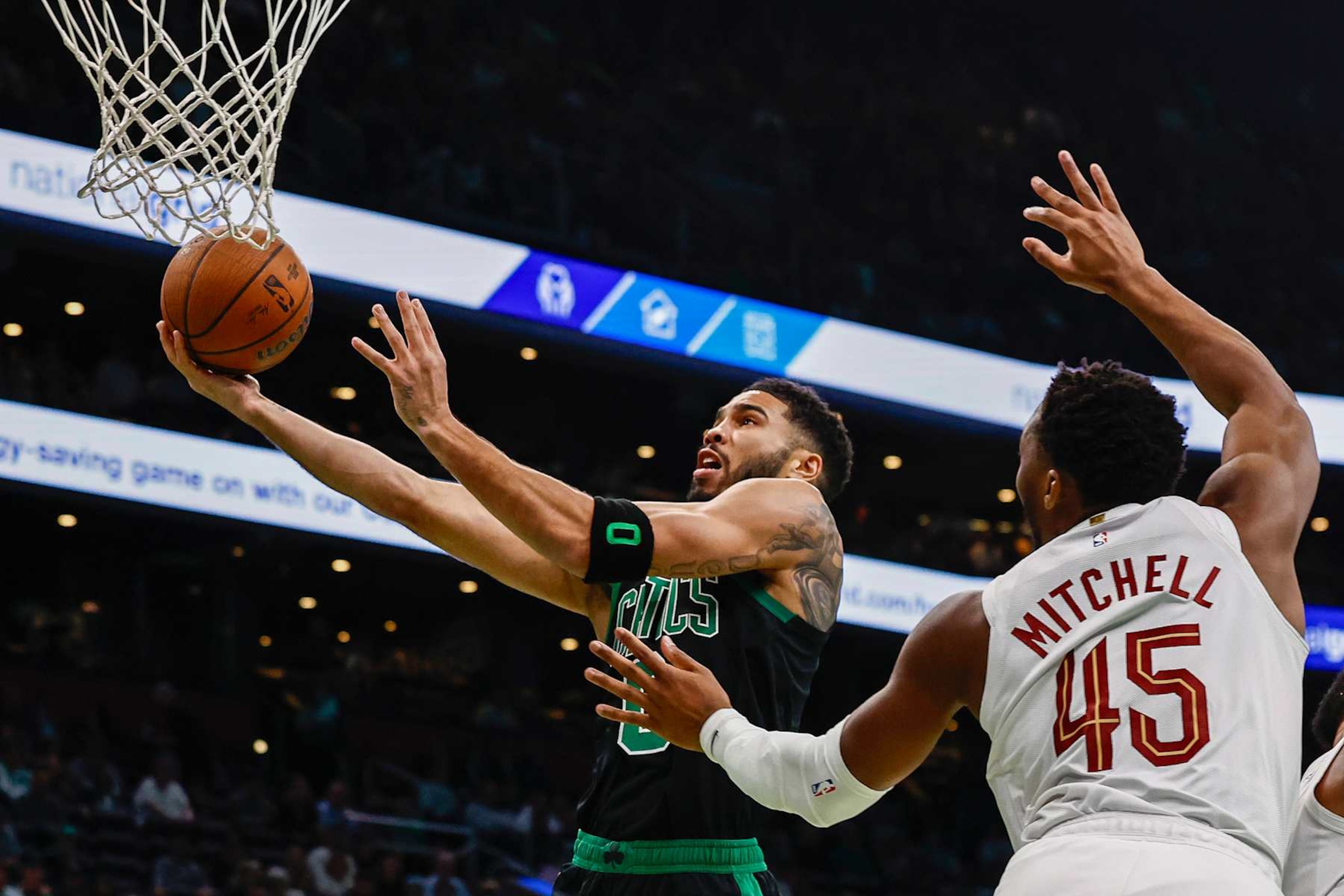 BOSTON, MASSACHUSETTS - NOVEMBER 19: Jayson Tatum #0 of the Boston Celtics shoots against Donovan Mitchell #45 of the Cleveland Cavaliers during the first quarter of the Emirates NBA Cup at TD Garden on November 19, 2024 in Boston, Massachusetts. NOTE TO USER: User expressly acknowledges and agrees that, by downloading and or using this photograph, User is consenting to the terms and conditions of the Getty Images License Agreement.  (Photo by Winslow Townson/Getty Images)