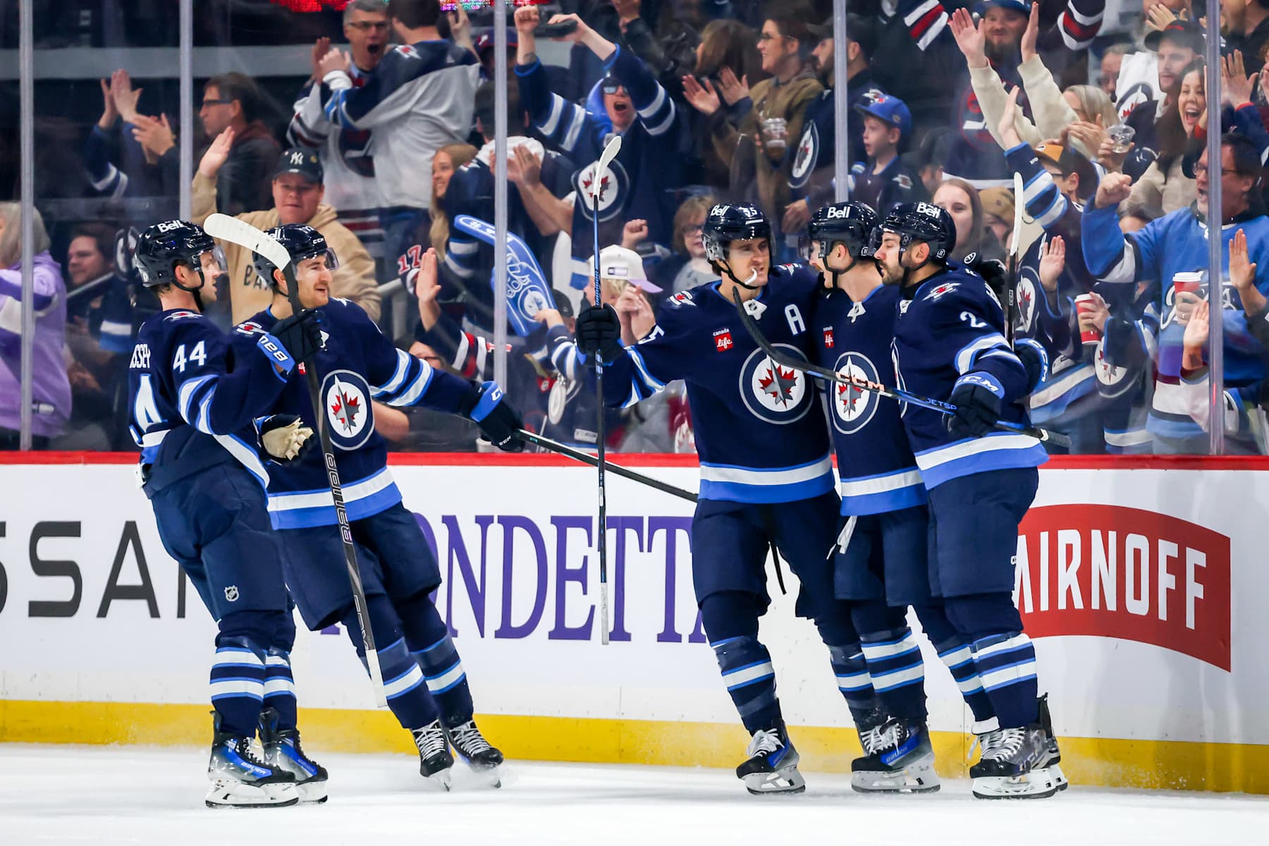 WINNIPEG, CANADA - NOVEMBER 19: Josh Morrissey #44, Gabriel Vilardi #13, Mark Scheifele #55, Kyle Connor #81 and Dylan DeMelo #2 of the Winnipeg Jets celebrate a first period goal against the Florida Panthers at the Canada Life Centre on November 19, 2024 in Winnipeg, Manitoba, Canada. (Photo by Jonathan Kozub/NHLI via Getty Images)