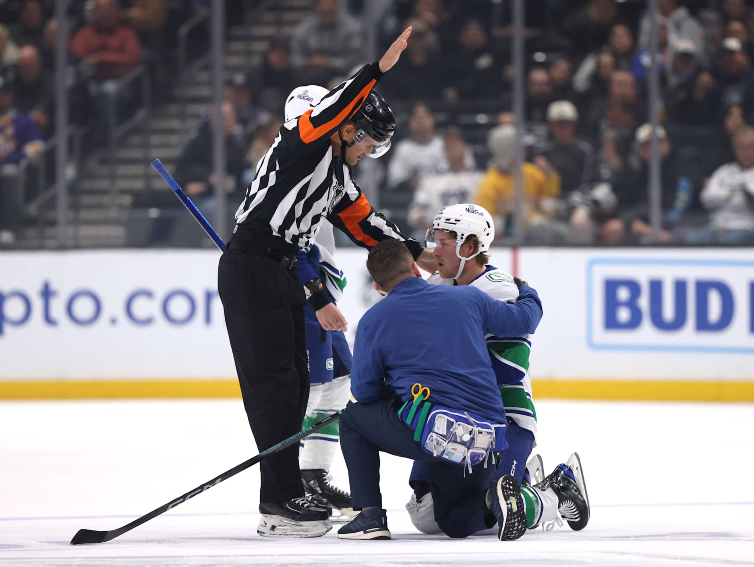 LOS ANGELES, CALIFORNIA - NOVEMBER 07: Brock Boeser #6 of the Vancouver Canucks received medical attention as the referee calls a Los Angeles Kings penalty during the first period at Crypto.com Arena on November 07, 2024 in Los Angeles, California. (Photo by Harry How/Getty Images) LOS ANGELES, CALIFORNIA - NOVEMBER 07: Brock Boeser #6 of the Vancouver Canucks received medical attention as the referee calls a Los Angeles Kings penalty during the first period at Crypto.com Arena on November 07, 2024 in Los Angeles, California. (Photo by Harry How/Getty Images)