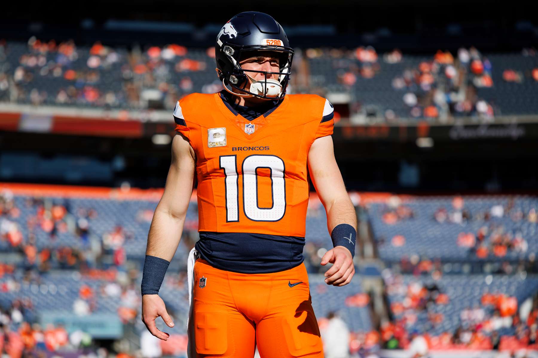 DENVER, COLORADO - NOVEMBER 17: Quarterback Bo Nix #10 of the Denver Broncos warms up prior to an NFL football game against the Atlanta Falcons at Empower Field at Mile High on November 17, 2024 in Denver, Colorado. (Photo by Brooke Sutton/Getty Images)