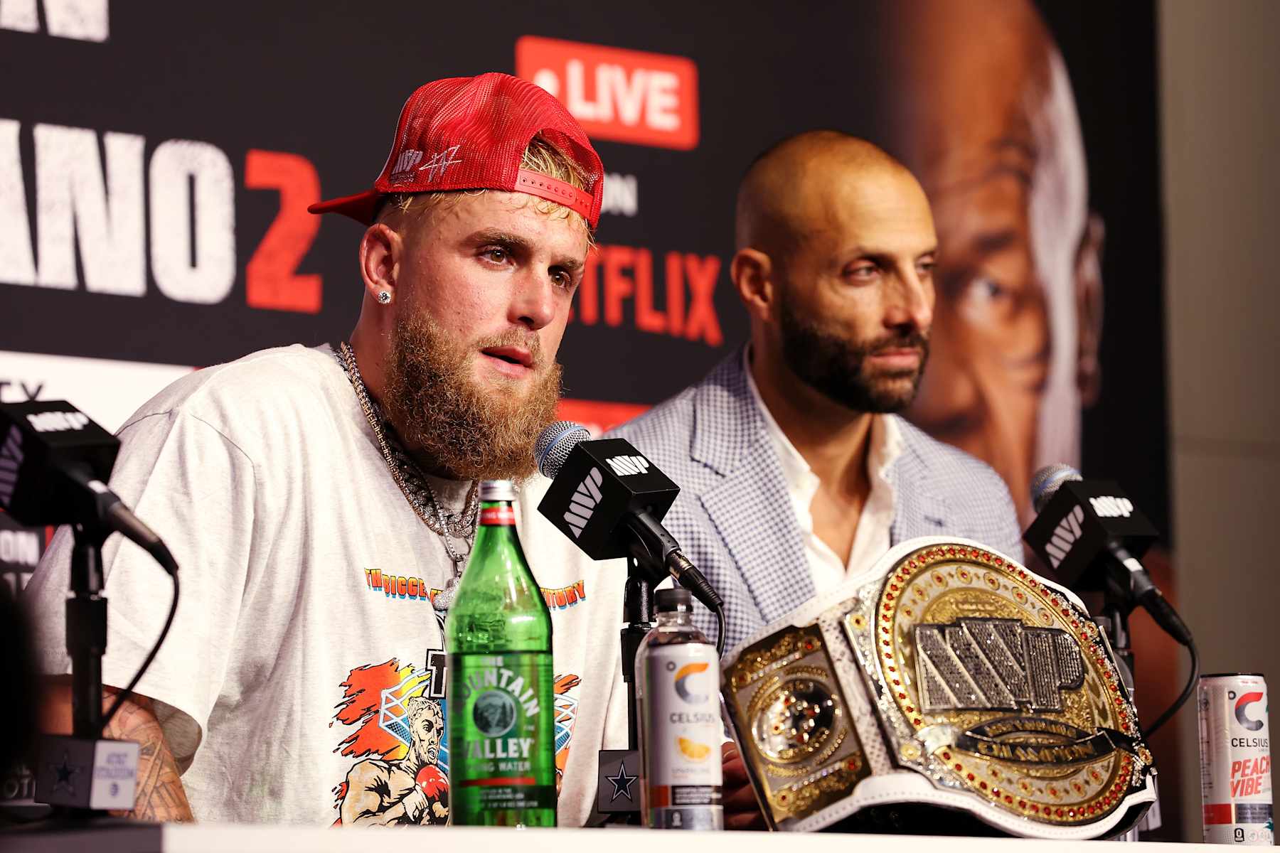 ARLINGTON, TEXAS - NOVEMBER 15: (L-R) Jake Paul and Michael Rubin speak during the post match press conference for LIVE On Netflix: Jake Paul vs. Mike Tyson at AT&T Stadium on November 15, 2024 in Arlington, Texas. (Photo by Sarah Stier/Getty Images for Netflix © 2024)