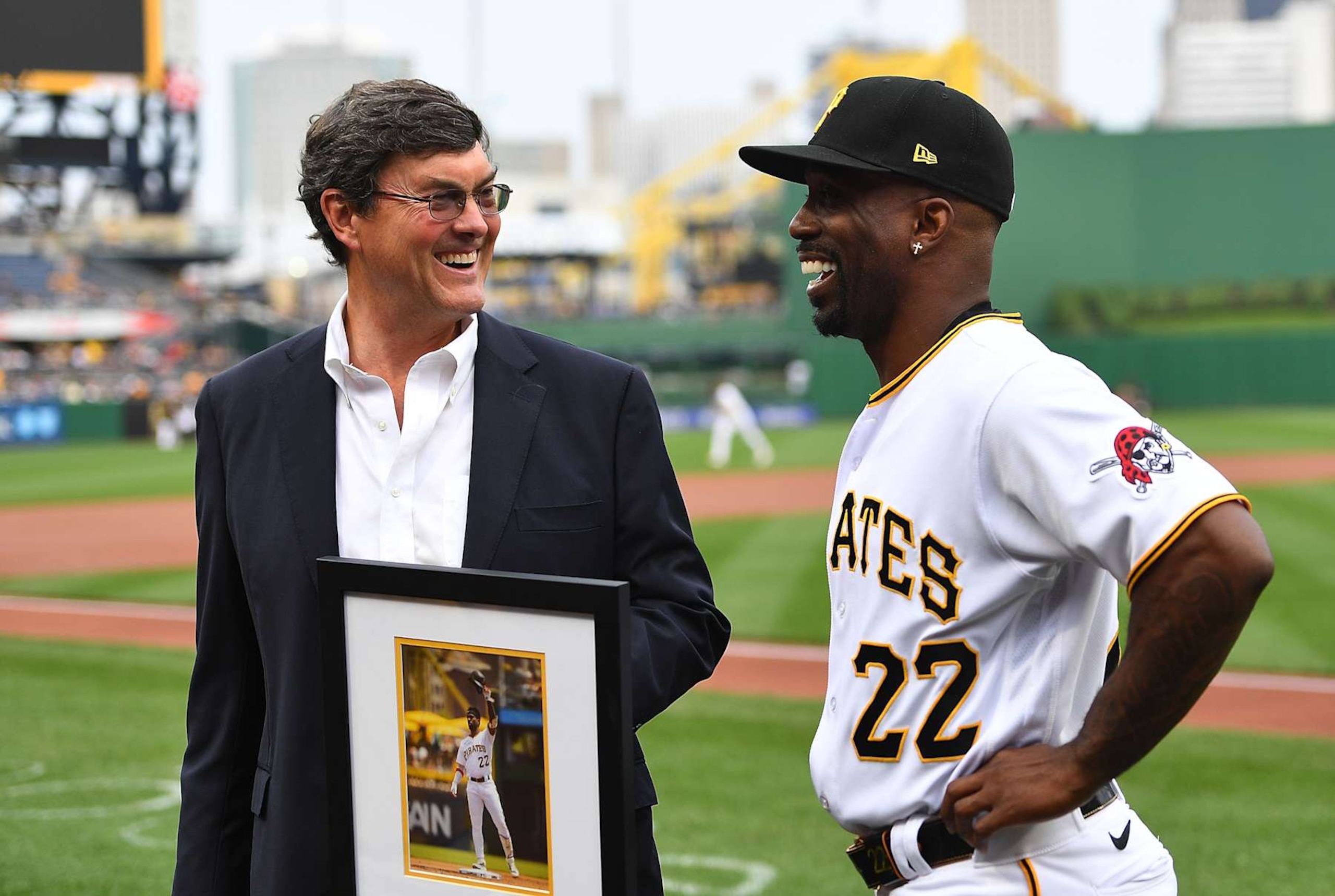 PITTSBURGH, PA - JUNE 20:  Pittsburgh Pirates owner Bob Nutting presents Andrew McCutchen #22 a framed photo in honor of his 2000th career hit prior to the game against the Chicago Cubs at PNC Park on June 20, 2023 in Pittsburgh, Pennsylvania. (Photo by Joe Sargent/Getty Images)