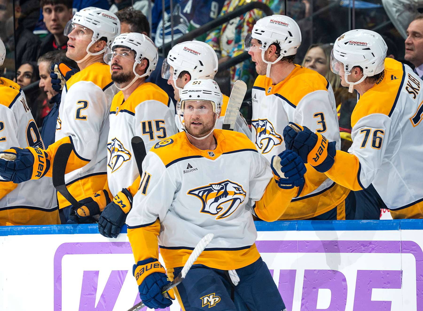 VANCOUVER, CANADA - NOVEMBER 17: Steven Stamkos #91 of the Nashville Predators is congratulated by teammates after scoring in the second period during their NHL game against the Vancouver Canucks at Rogers Arena on November 17, 2024 in Vancouver, British Columbia, Canada. (Photo by Jeff Vinnick/NHLI via Getty Images)