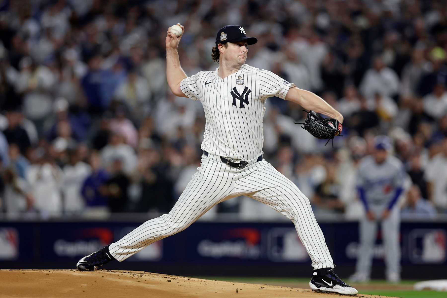 NEW YORK, NEW YORK - OCTOBER 30: (NEW YORK DAILIES OUT)  Gerrit Cole #45 of the New York Yankees in action against the Los Angeles Dodgers during Game Five of the 2024 World Series at Yankee Stadium on October 30, 2024 in New York City. The Dodgers defeated the Yankees 7-6. (Photo by Jim McIsaac/Getty Images)
